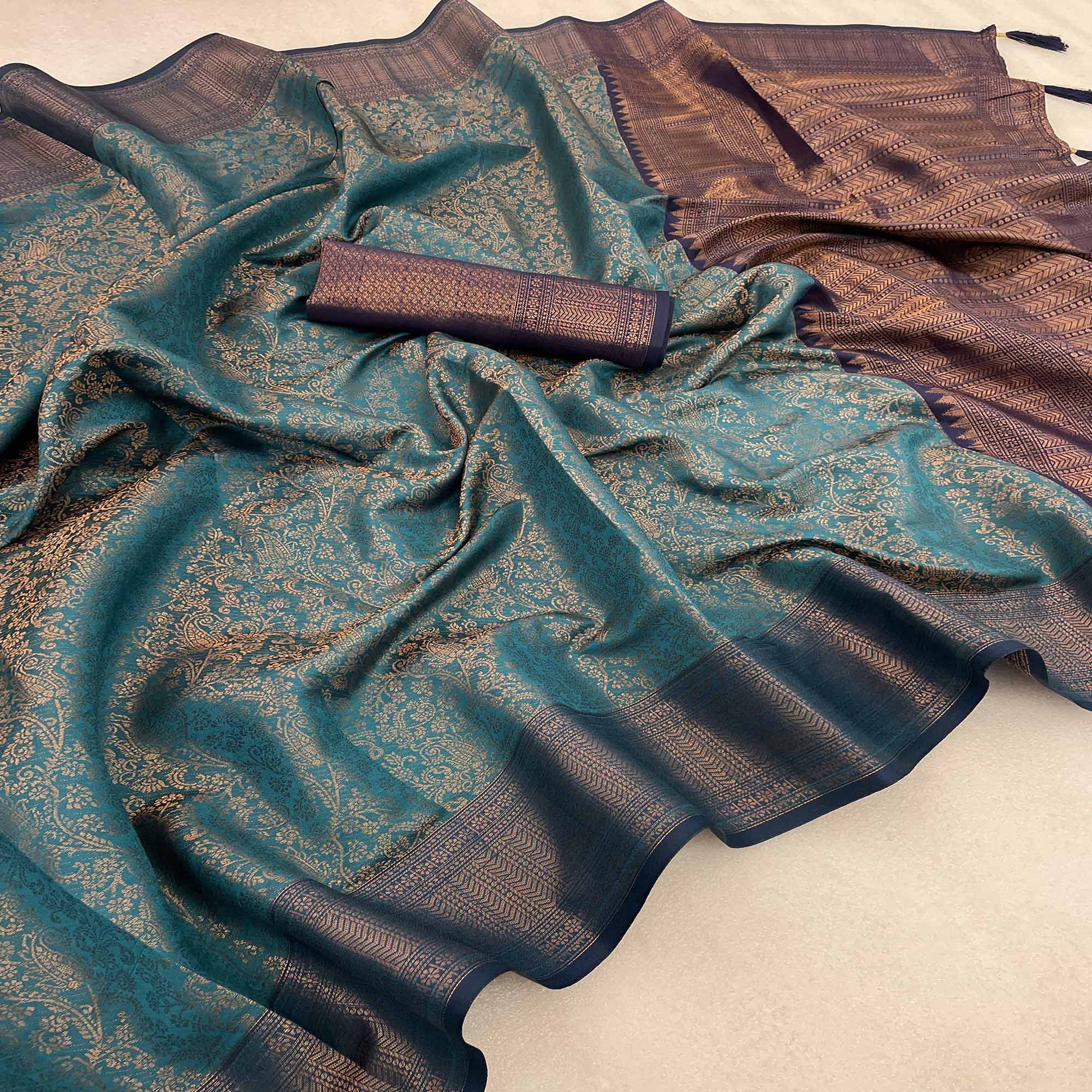 Teal Woven Banarasi Silk Saree With Tassels