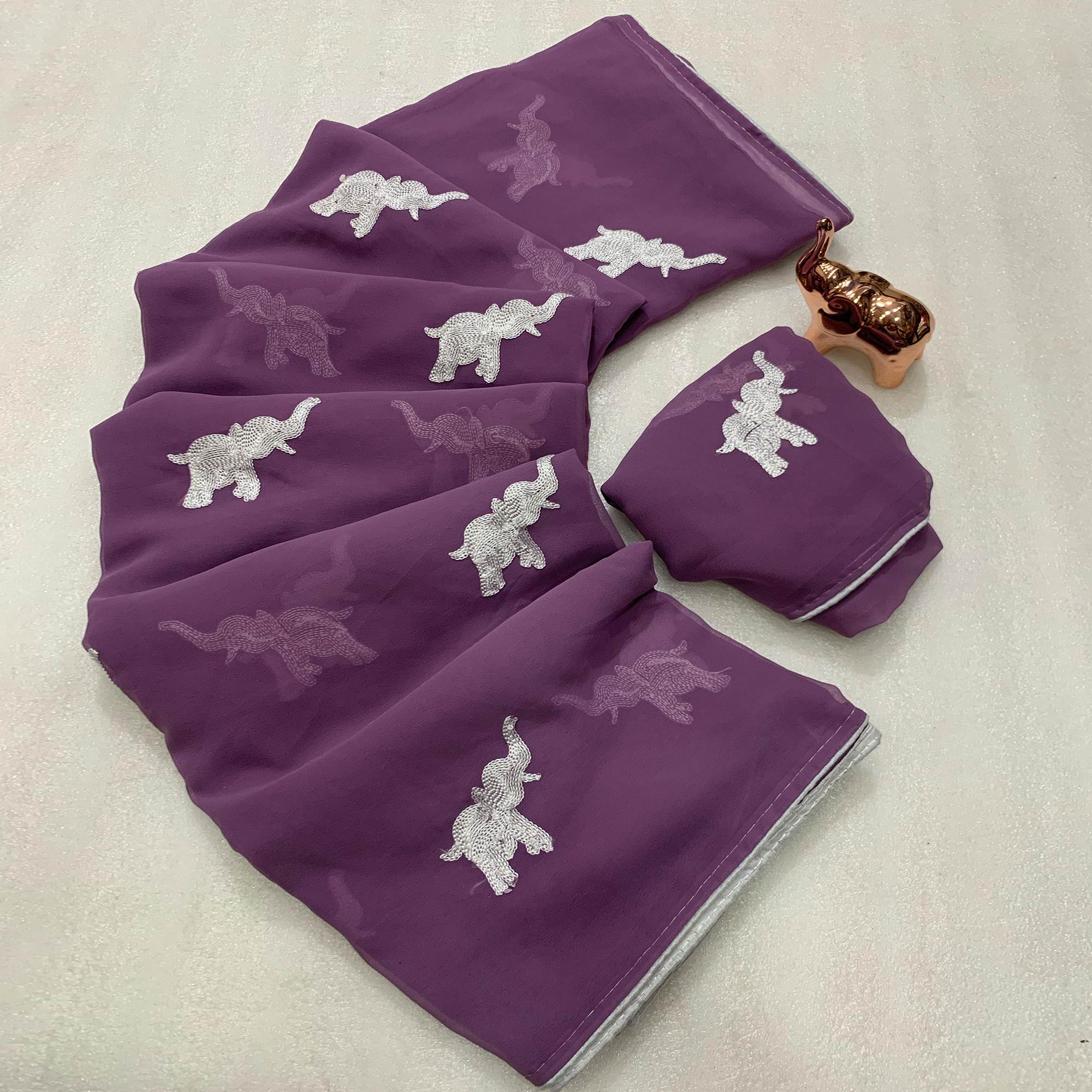 Light Purple Georgette Saree Featuring Exquisite Elephant Embroidery