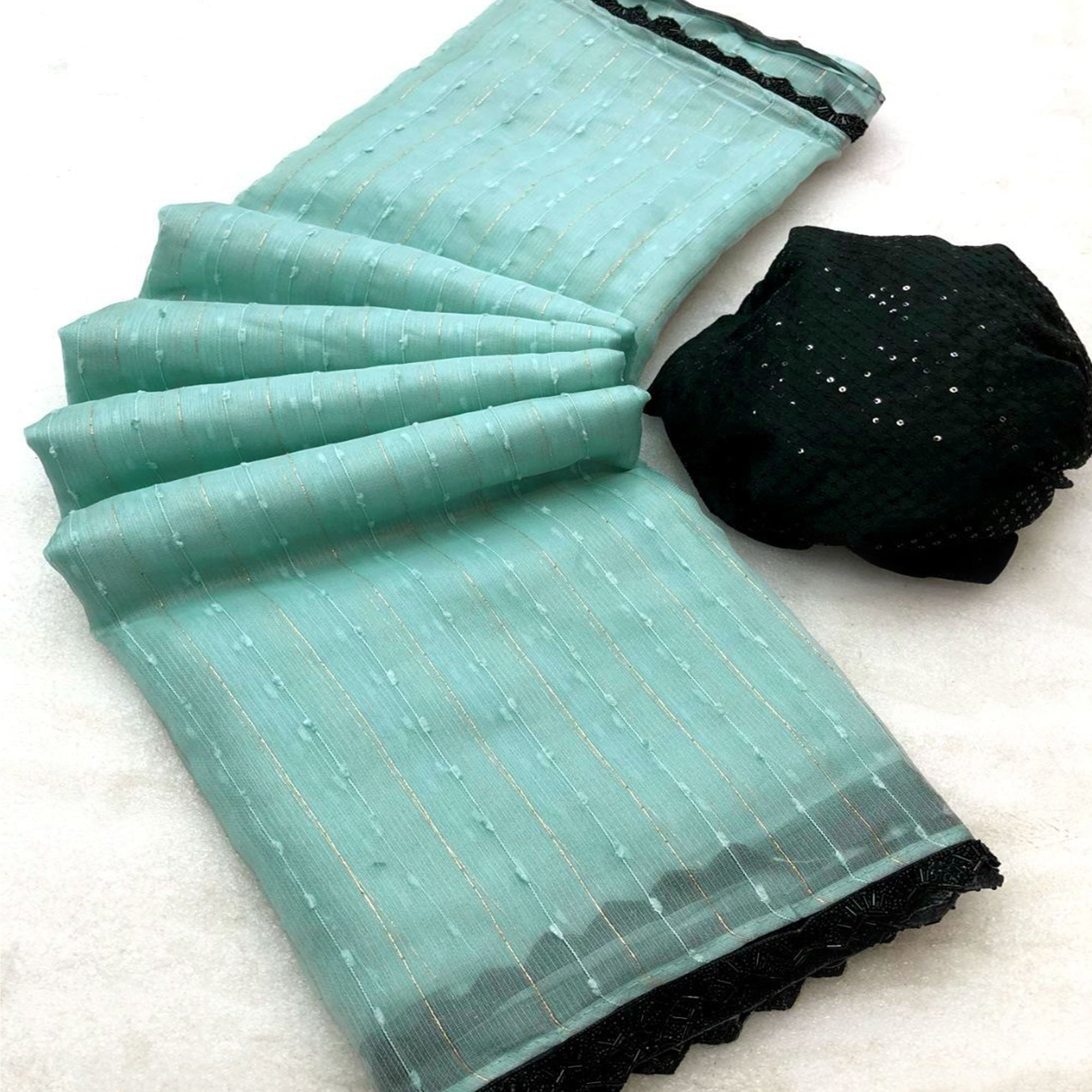 Light Turquoise Woven Organza Saree With Beads Work Border