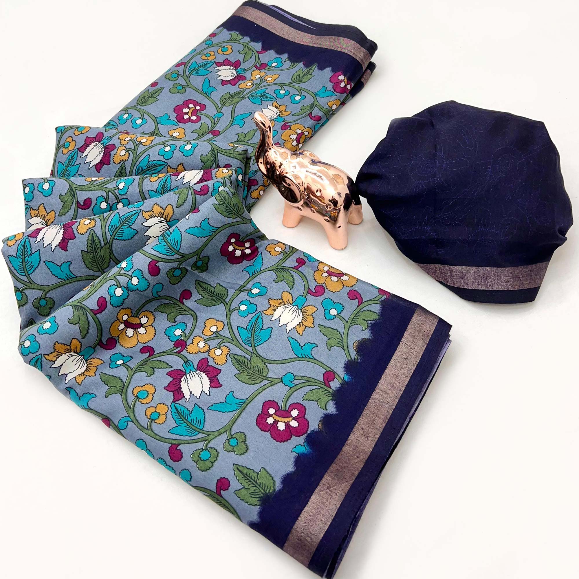 Grey Floral Printed Tussar Silk Blend Saree Enhanced With Intricate Zari Border Work