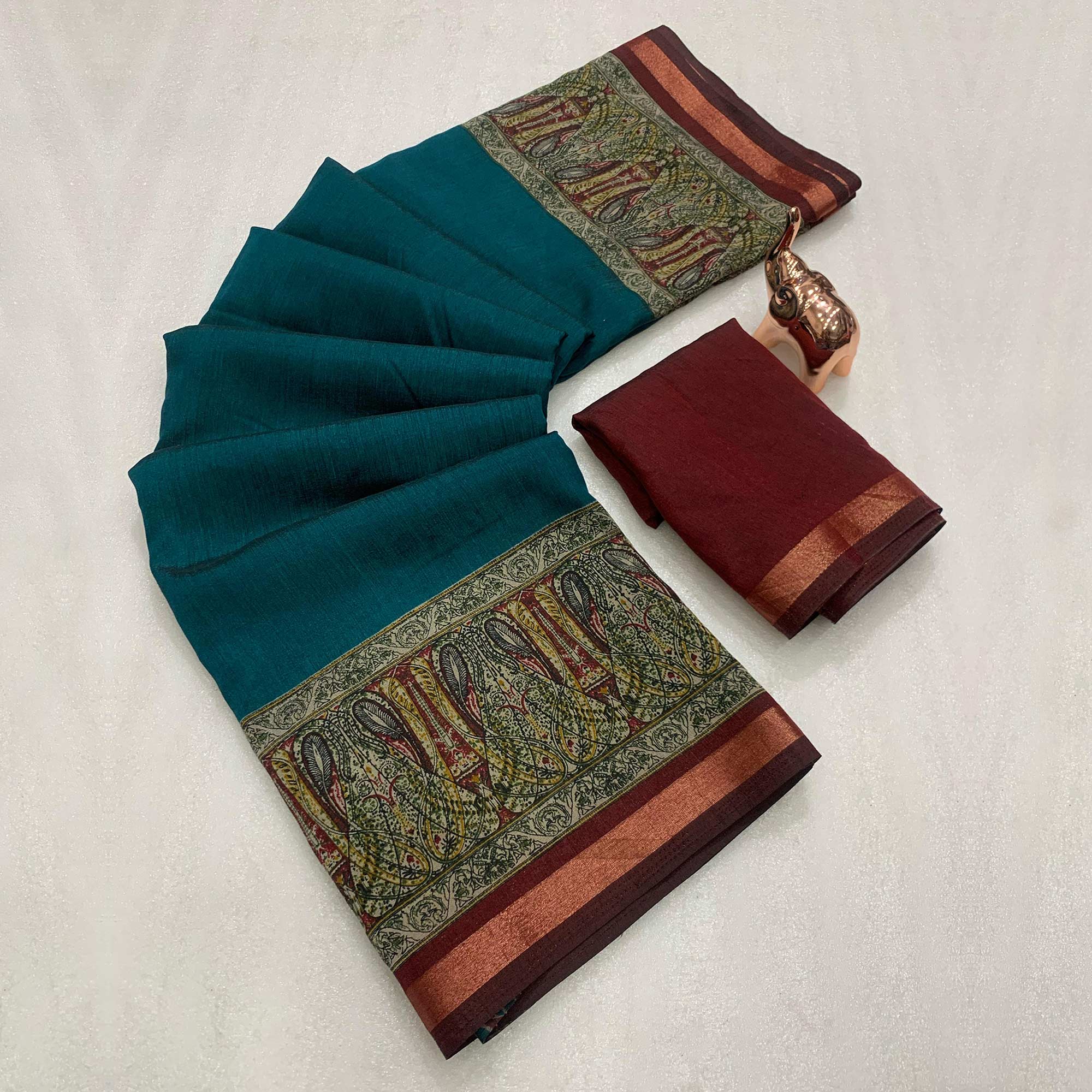 Teal Blue Solid Maheshwari Silk Blend Saree Adorned With Ajrakh Print & Two Tone Finish