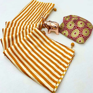 Luxe Partywear Saree in Mustard Satin with Modern Striped Print and Flowing Drape