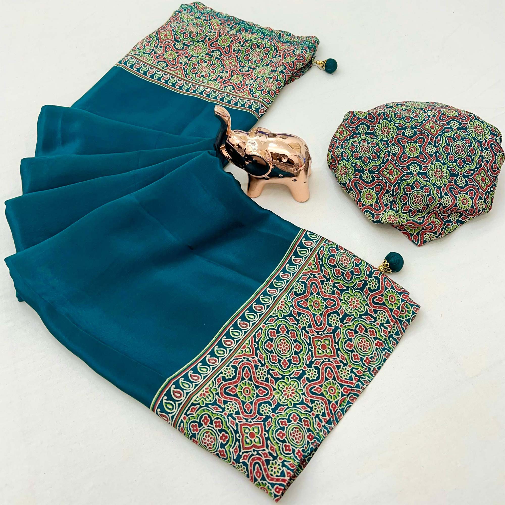 Teal Satin Saree Showcasing Rich Ajrakh Printed Design & Tassel Finished Pallu