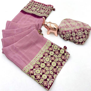 Dusty Rose Pink Solid Satin Saree Featuring Bold Ajrakh Print and Tassel Accented Pallu