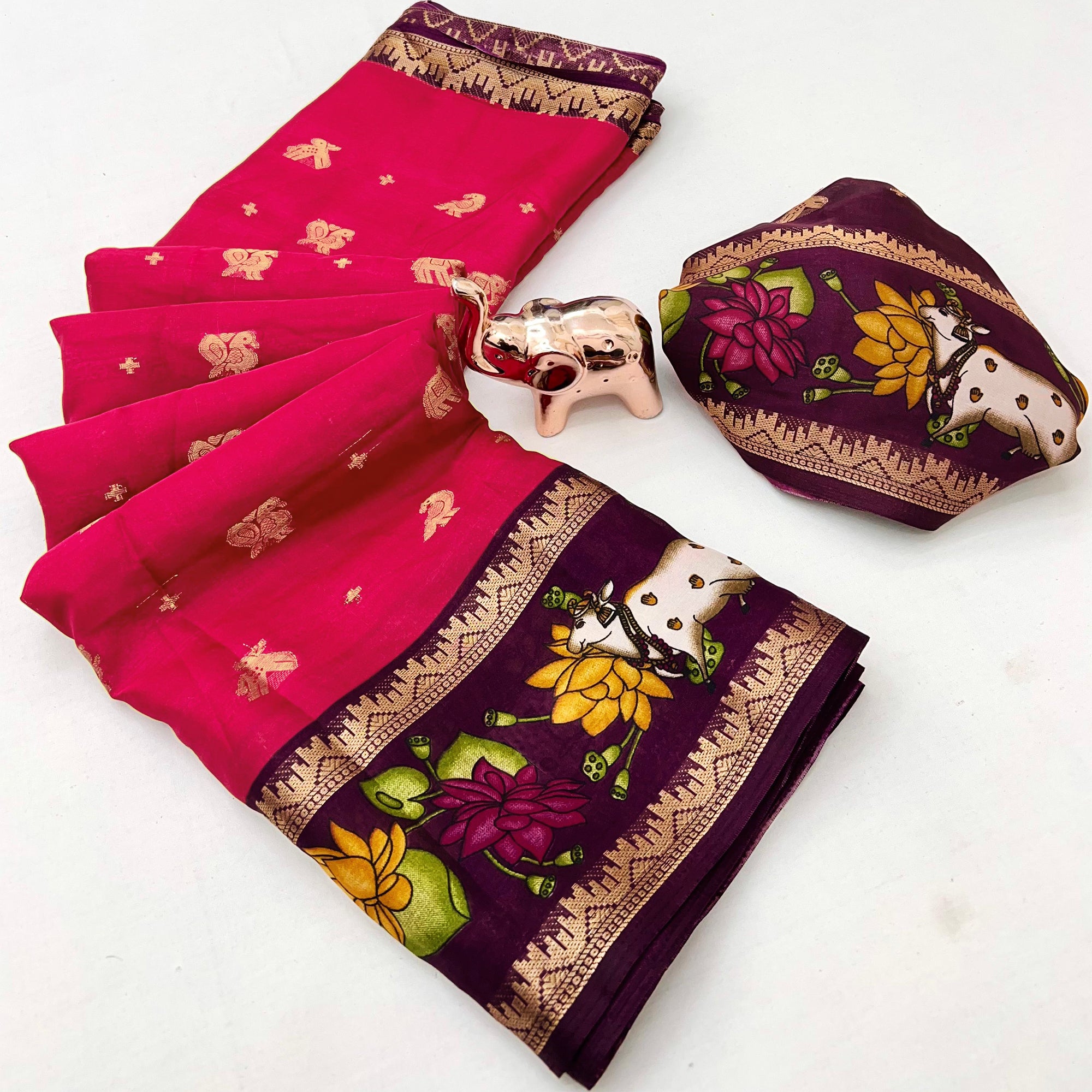 Elegant Pink Peacock Pattern Zari Weaving Georgette Saree With Tassel Pallu