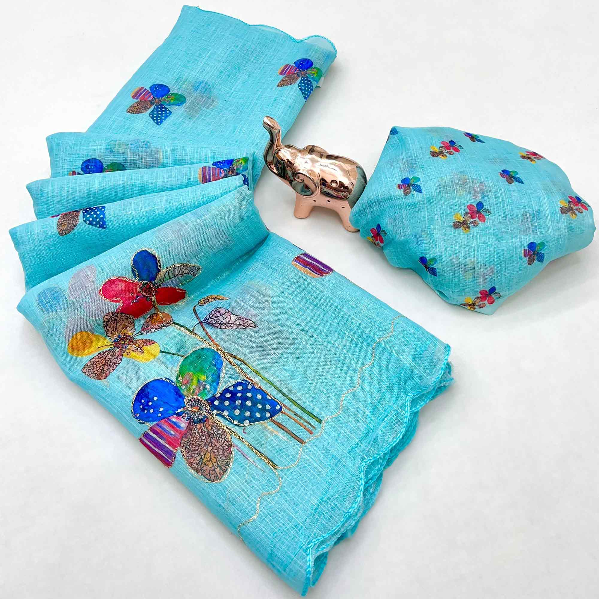 Blue Linen Saree Featuring Floral Digital Print With Zari Outline & Cutwork Border