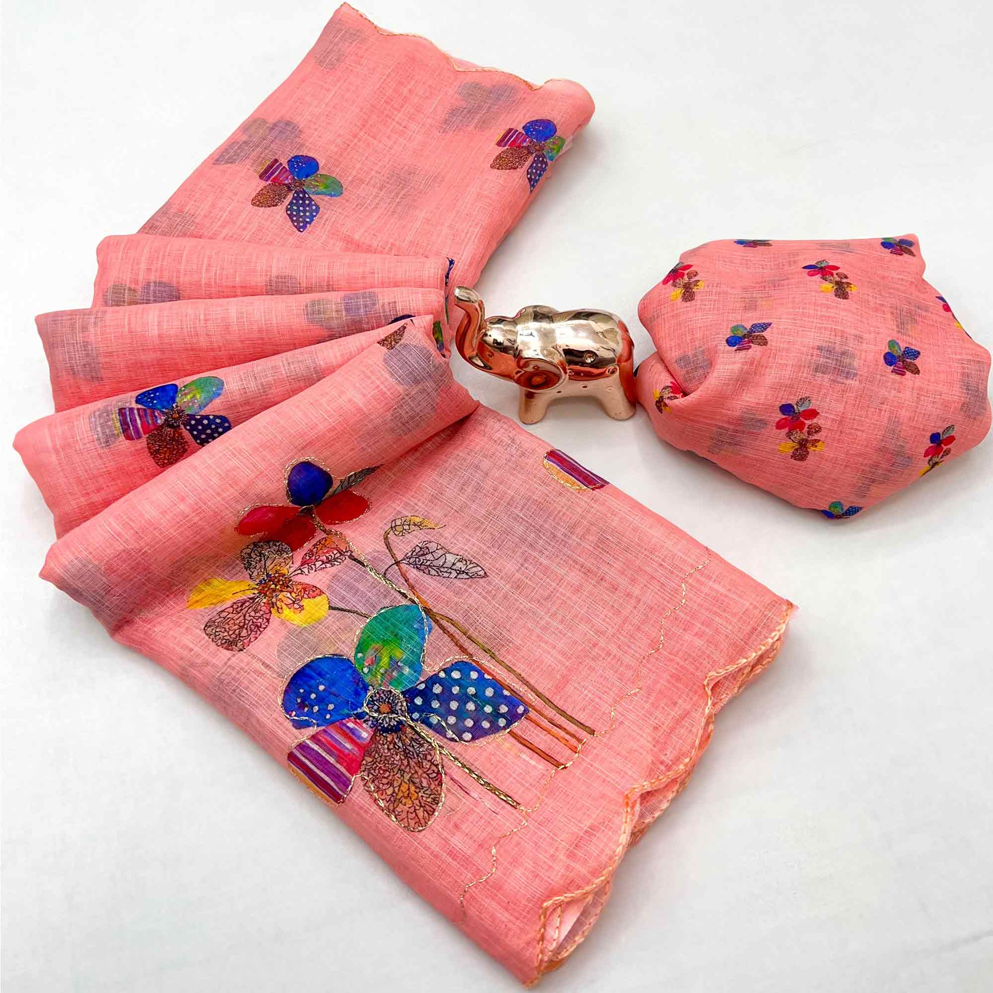 Coral Pink Linen Saree Featuring Floral Digital Print With Zari Outline & Cutwork Border