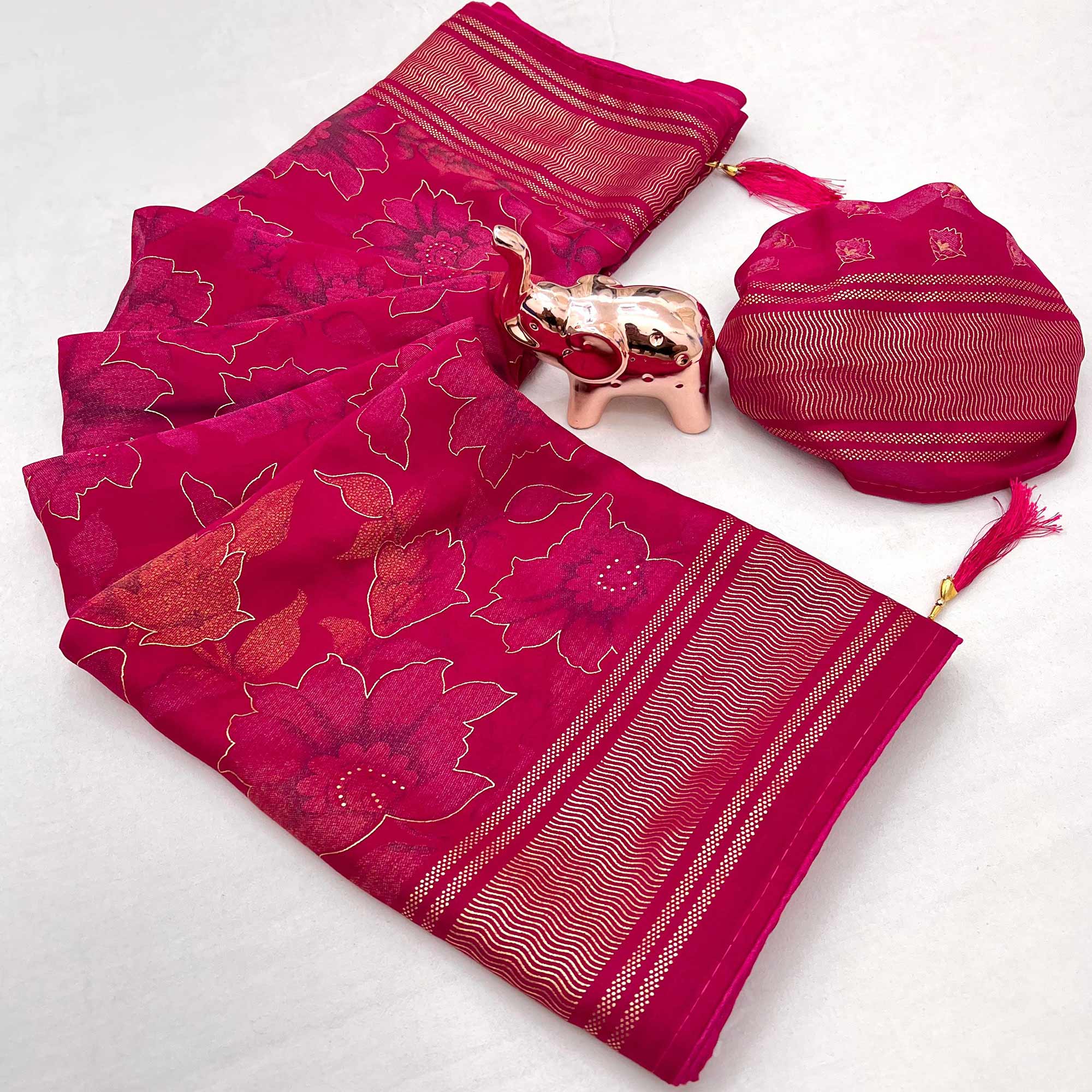 Pink Floral Foil Printed Georgette Saree With Tassels