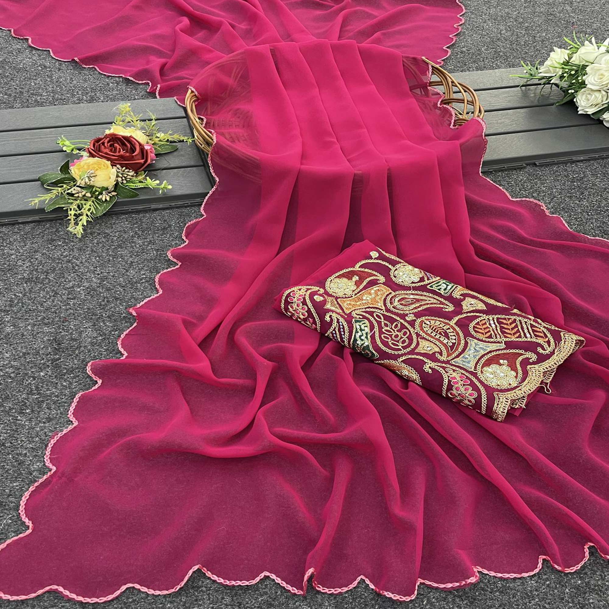 Pink Solid Georgette Saree With Embroidered Border