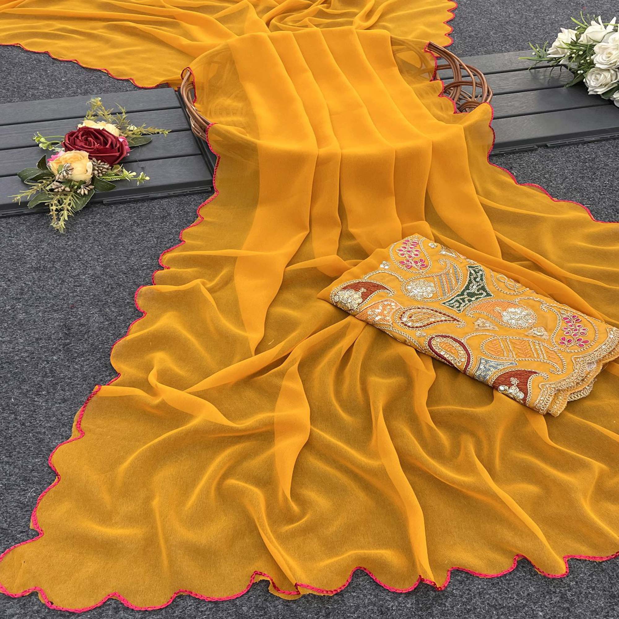 Yellow Solid Georgette Saree With Embroidered Border