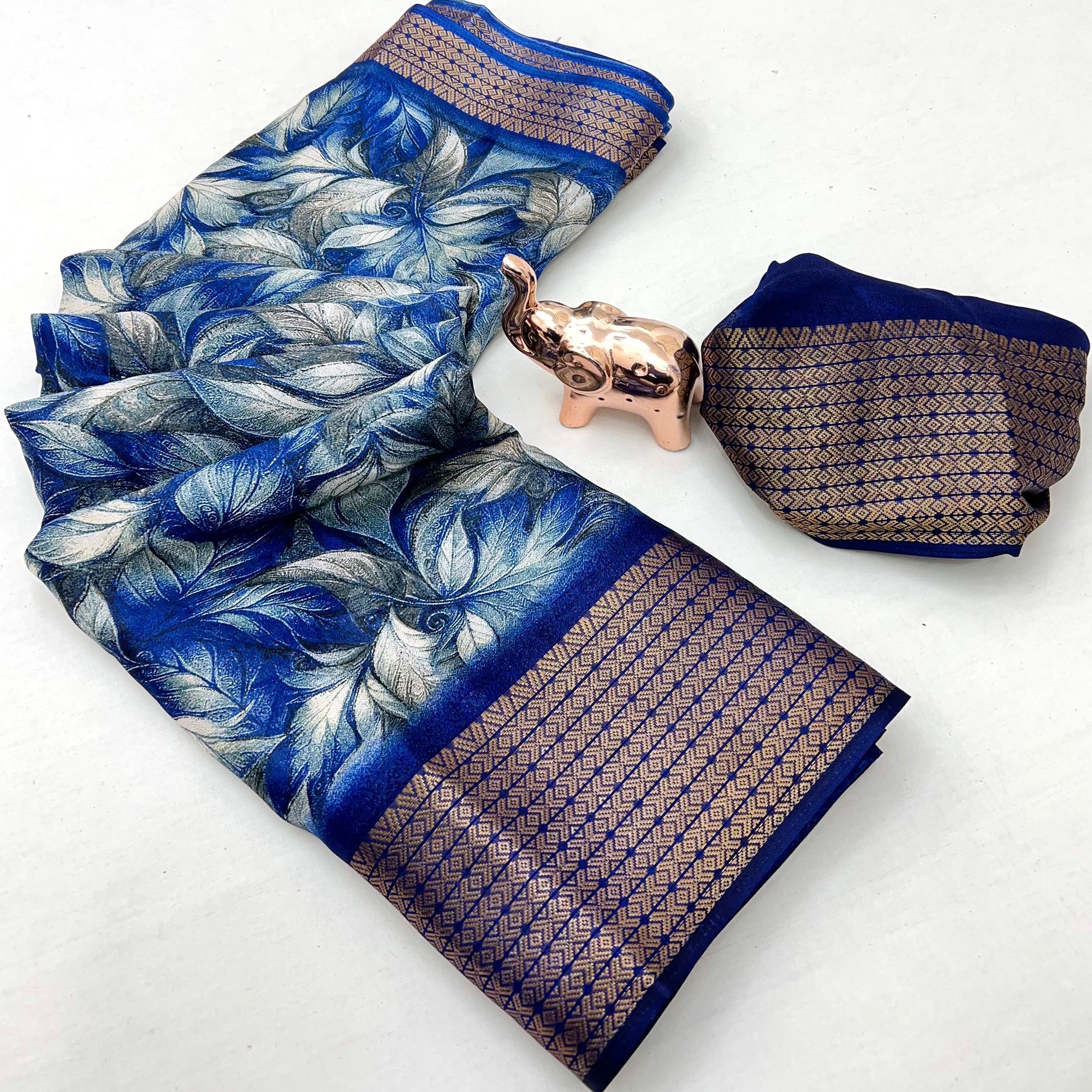 Royal Blue Leaf Print Dola Silk Marshmallow Saree With Paisley Jaal Pallu & Lustrous Weaving Border