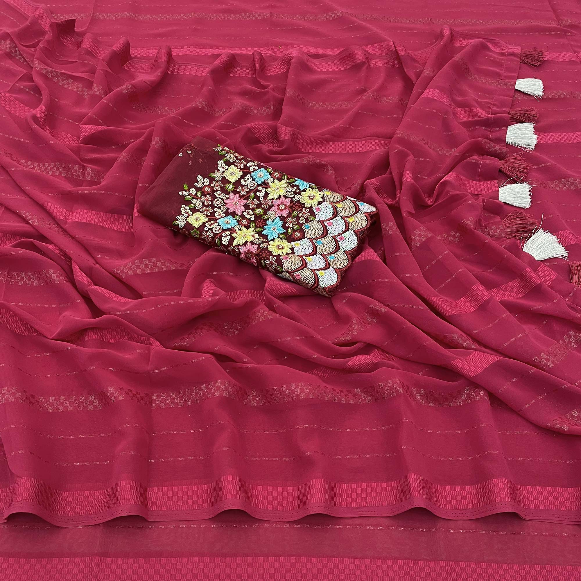 Maroon Woven Georgette Saree With Tassels