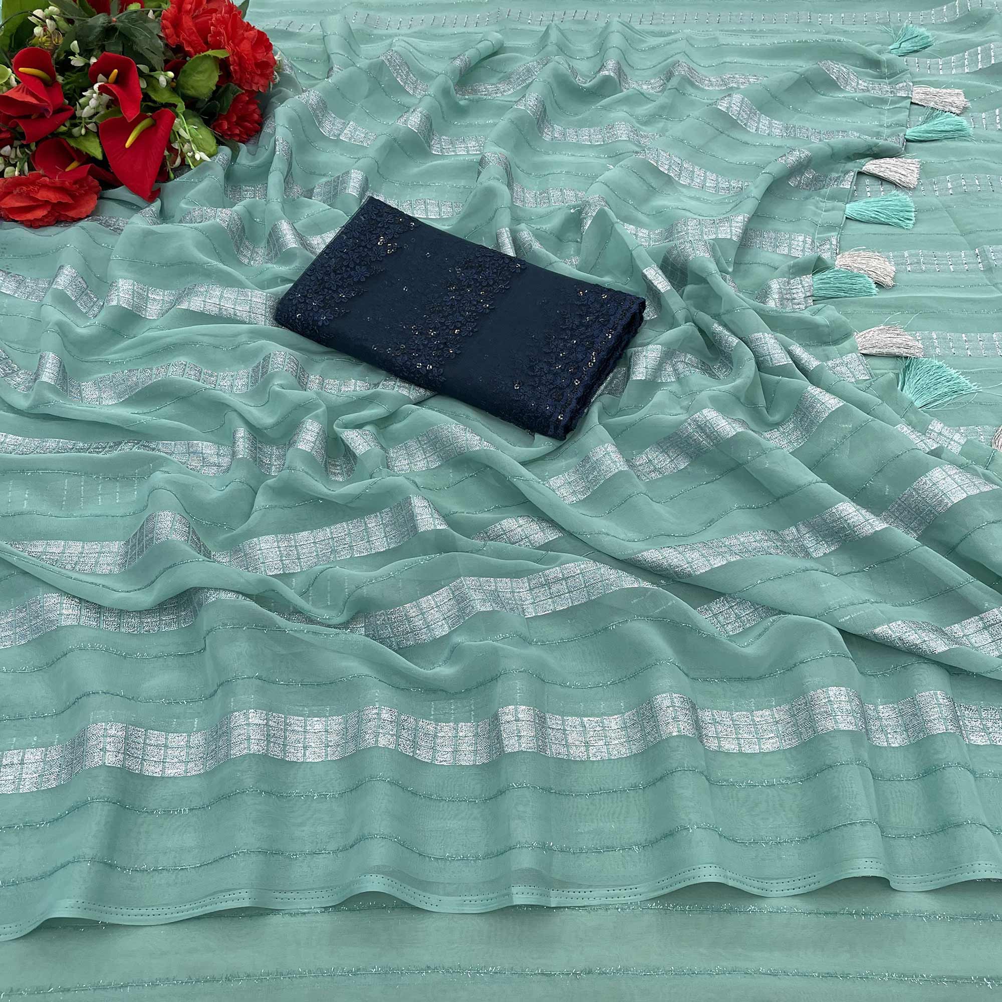Sea Green Zari Striped Georgette Saree With Tassels