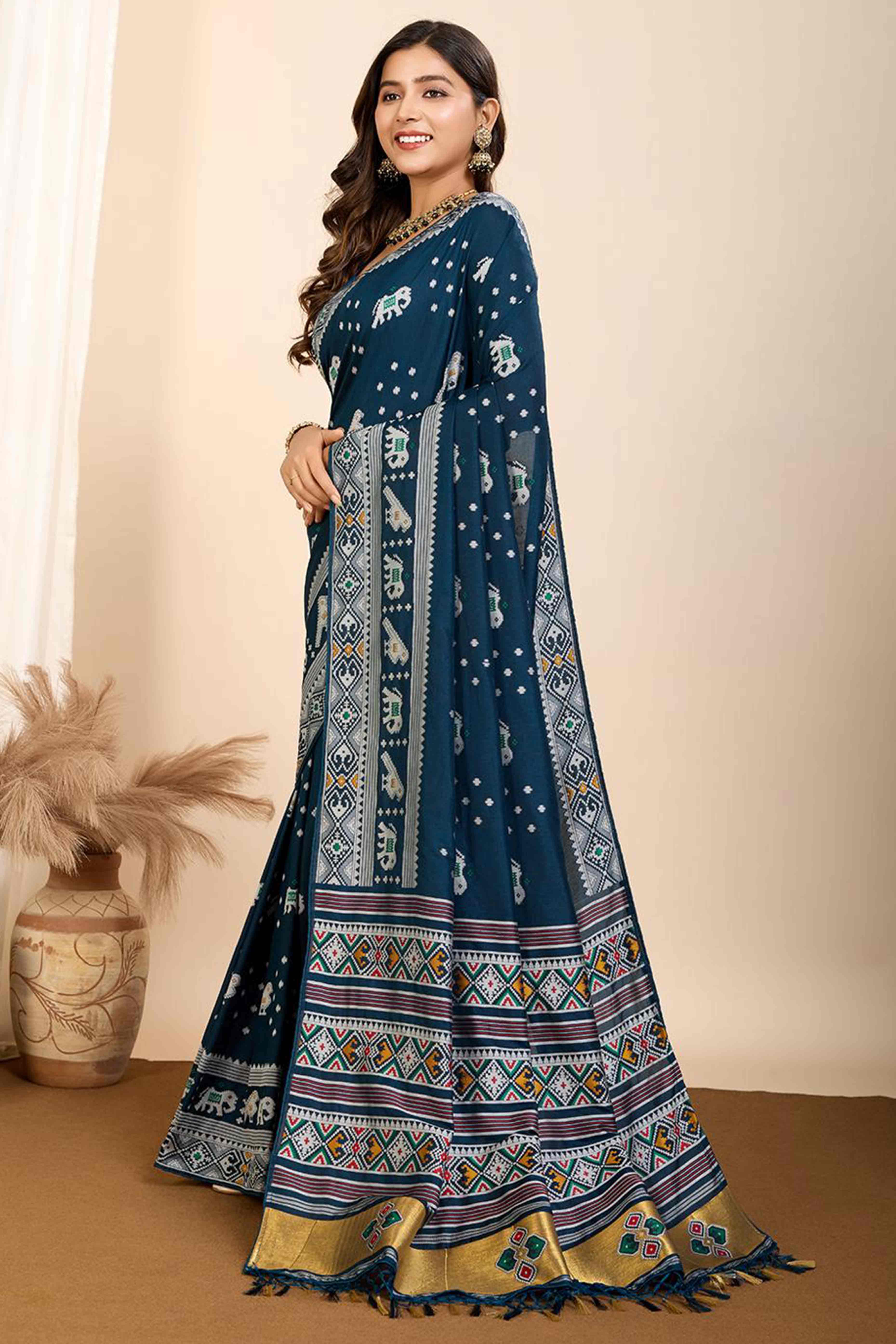 Blue Woven Dola Silk Patola Saree With Tassels