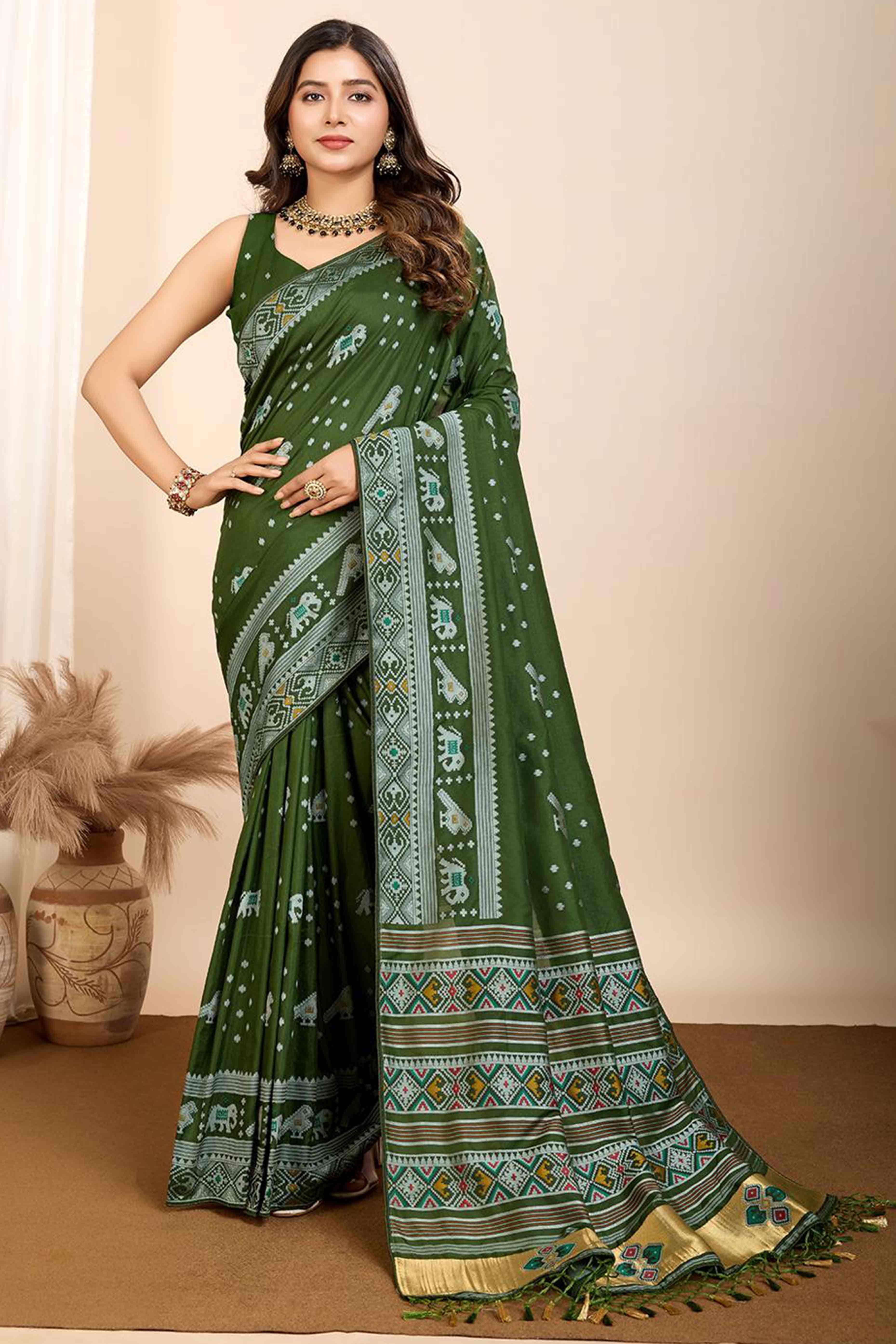 Green Woven Dola Silk Patola Saree With Tassels