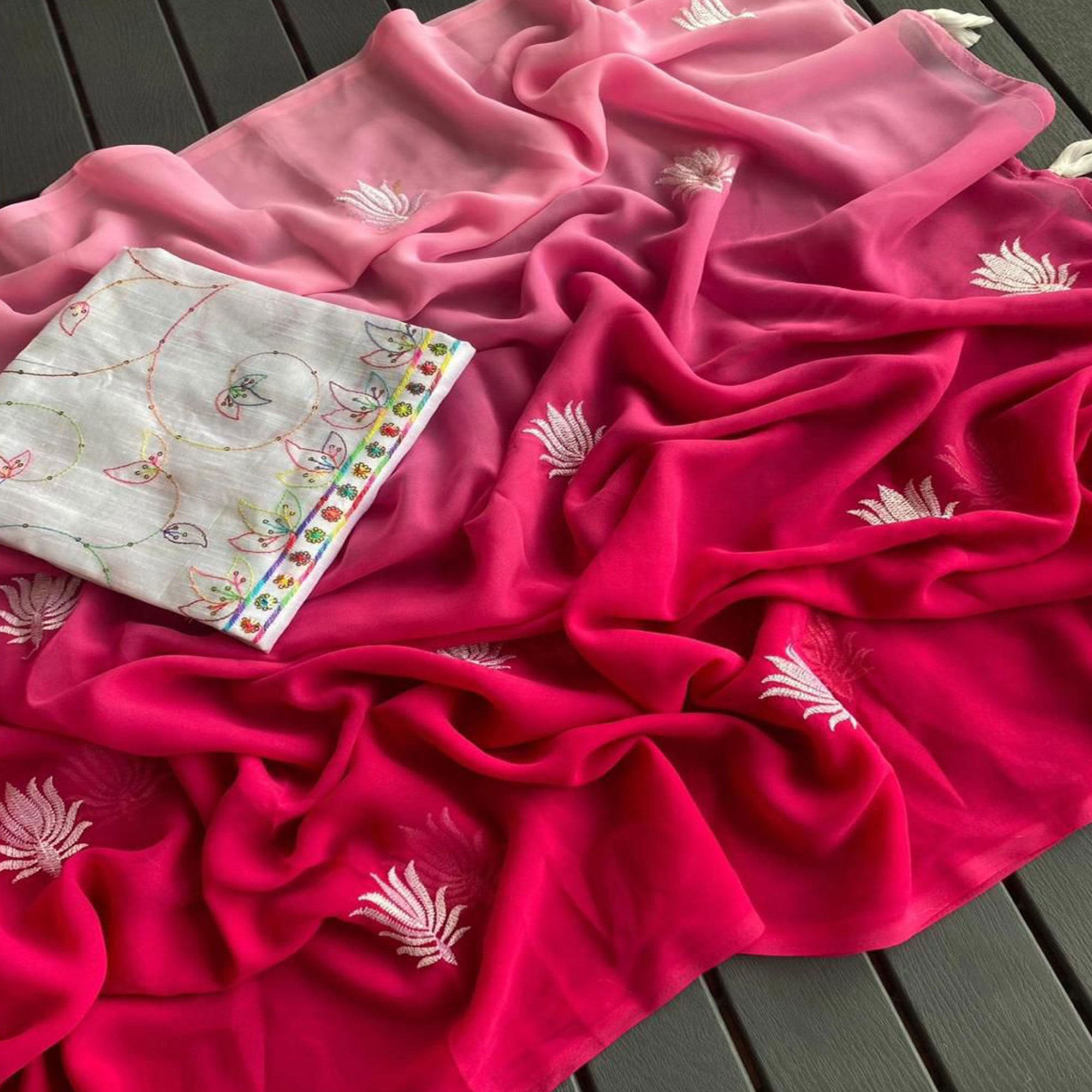 Rani Pink Floral Embroidered Georgette Saree With Tassels