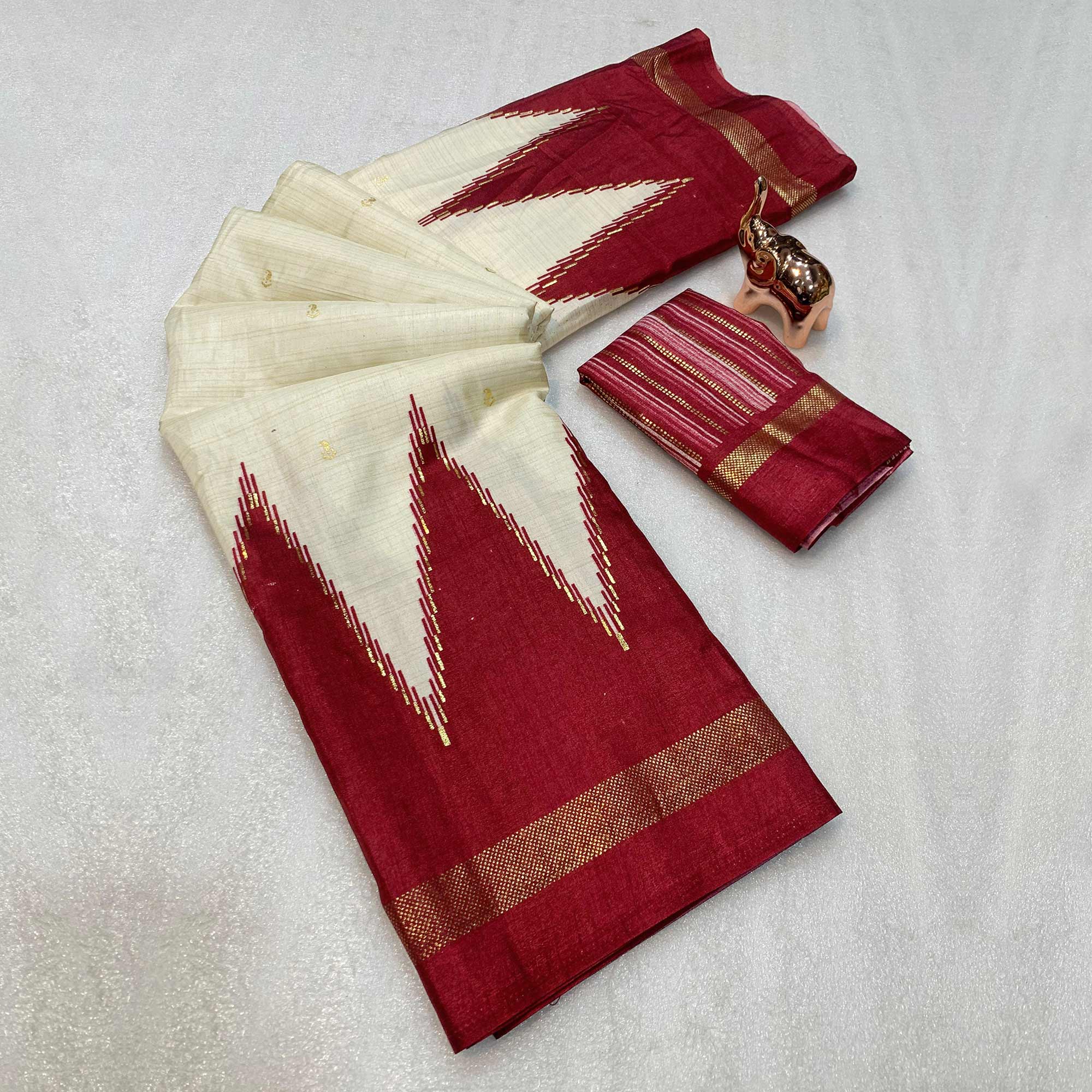 Subtle & Stylish Cream Saree With Ikkat Prints In Luxe Dola Silk For Festive Wear