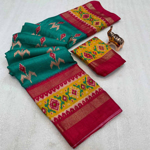 Subtle and Stylish Teal Saree with Ikkat Prints in Luxe Dola Silk for Festive Wear