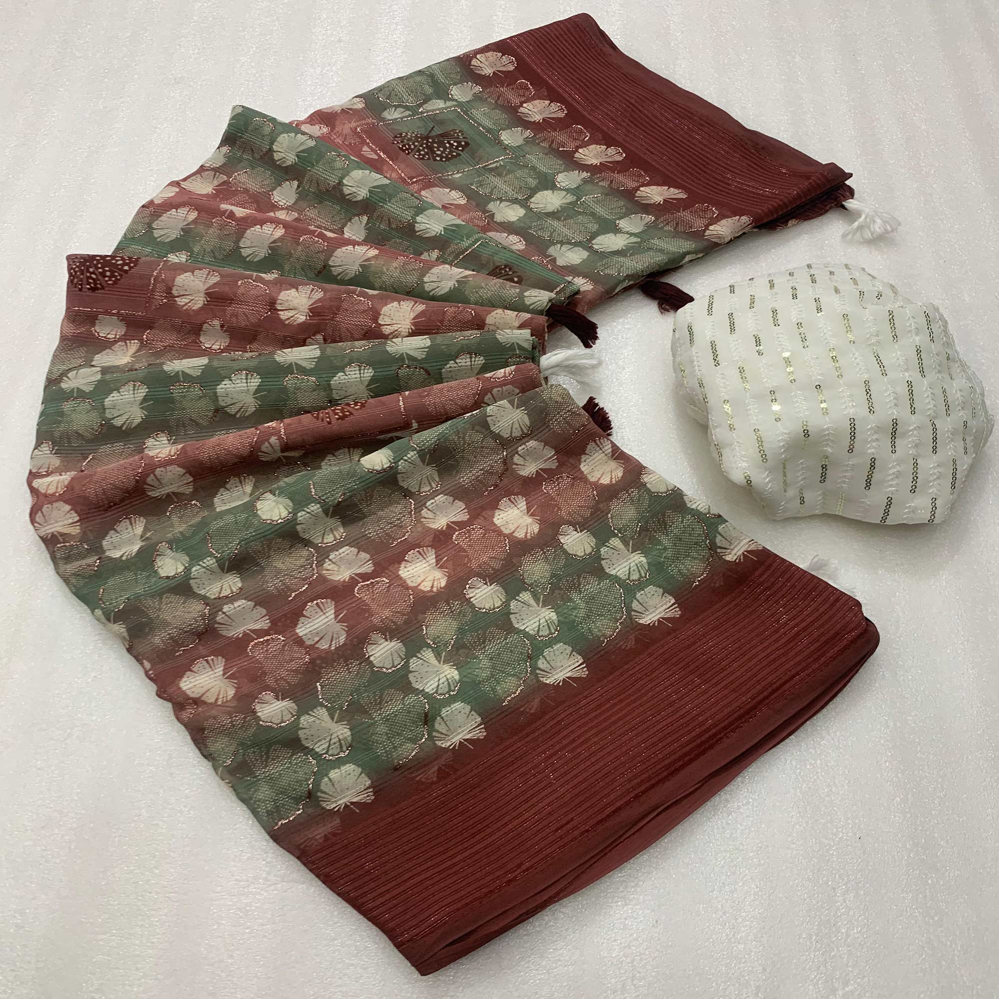 Maroon Floral Foil Printed Georgette Saree With Tassels