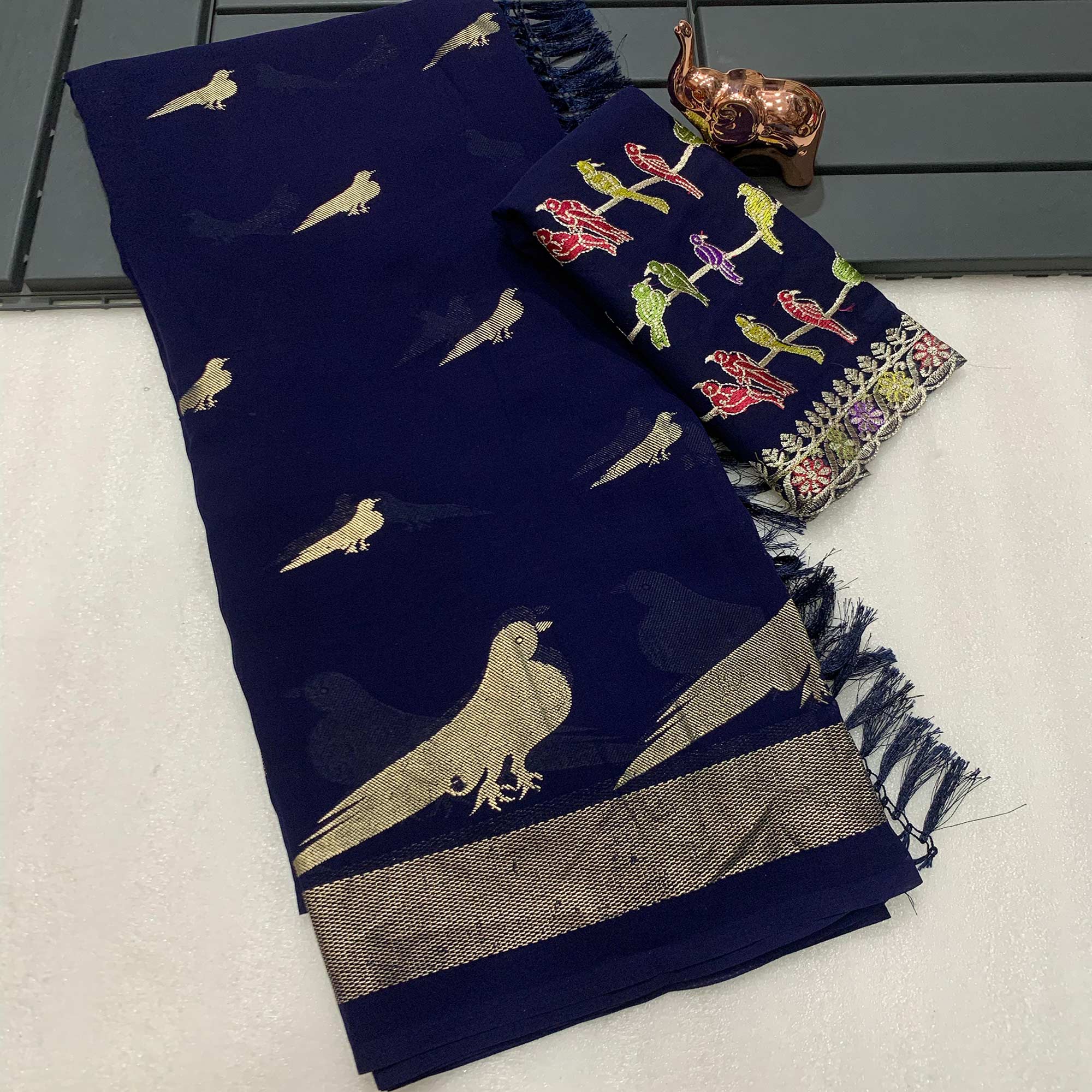 Blue Georgette Saree Adorned With Elegant Bird Embroidery