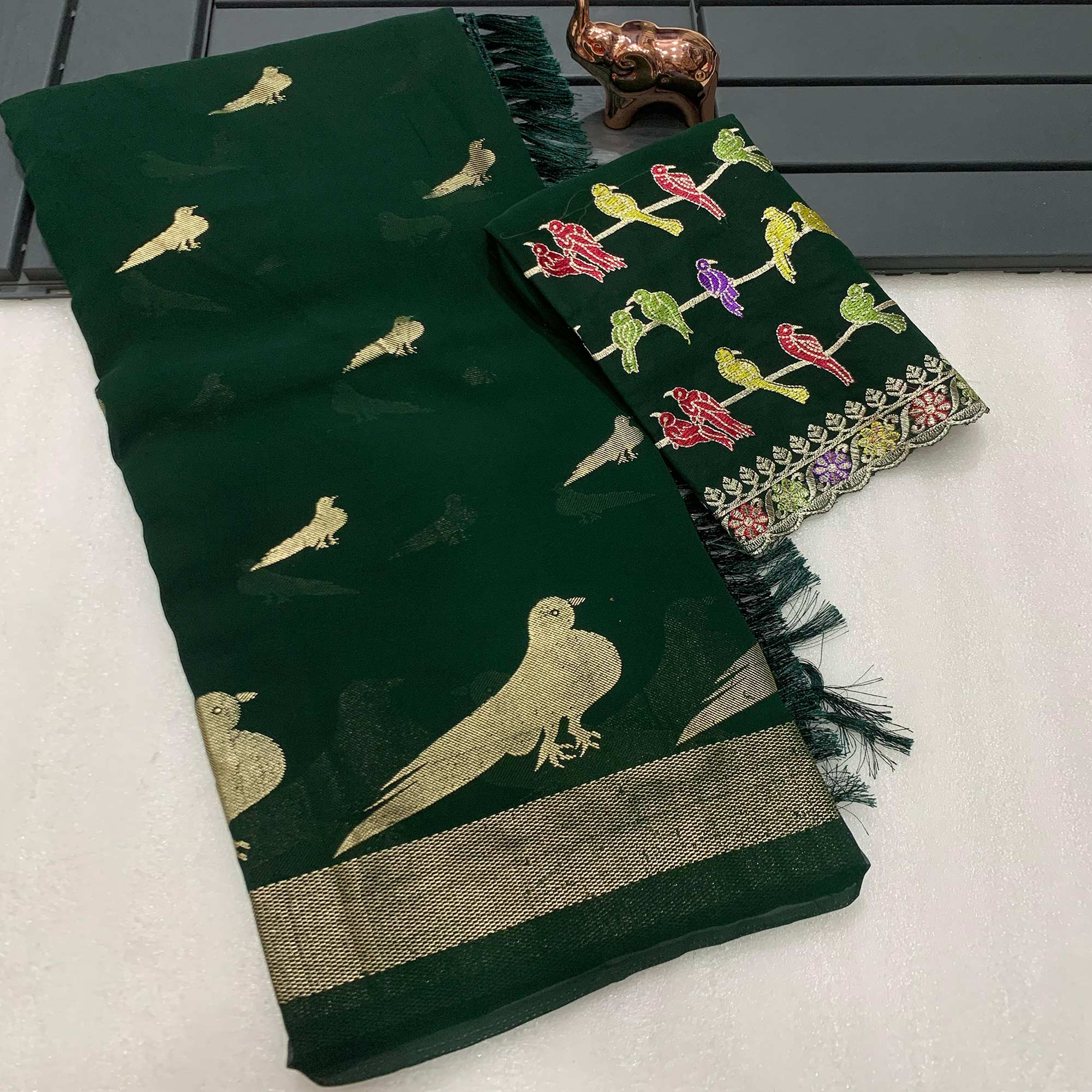 Green Georgette Saree Adorned With Elegant Bird Embroidery