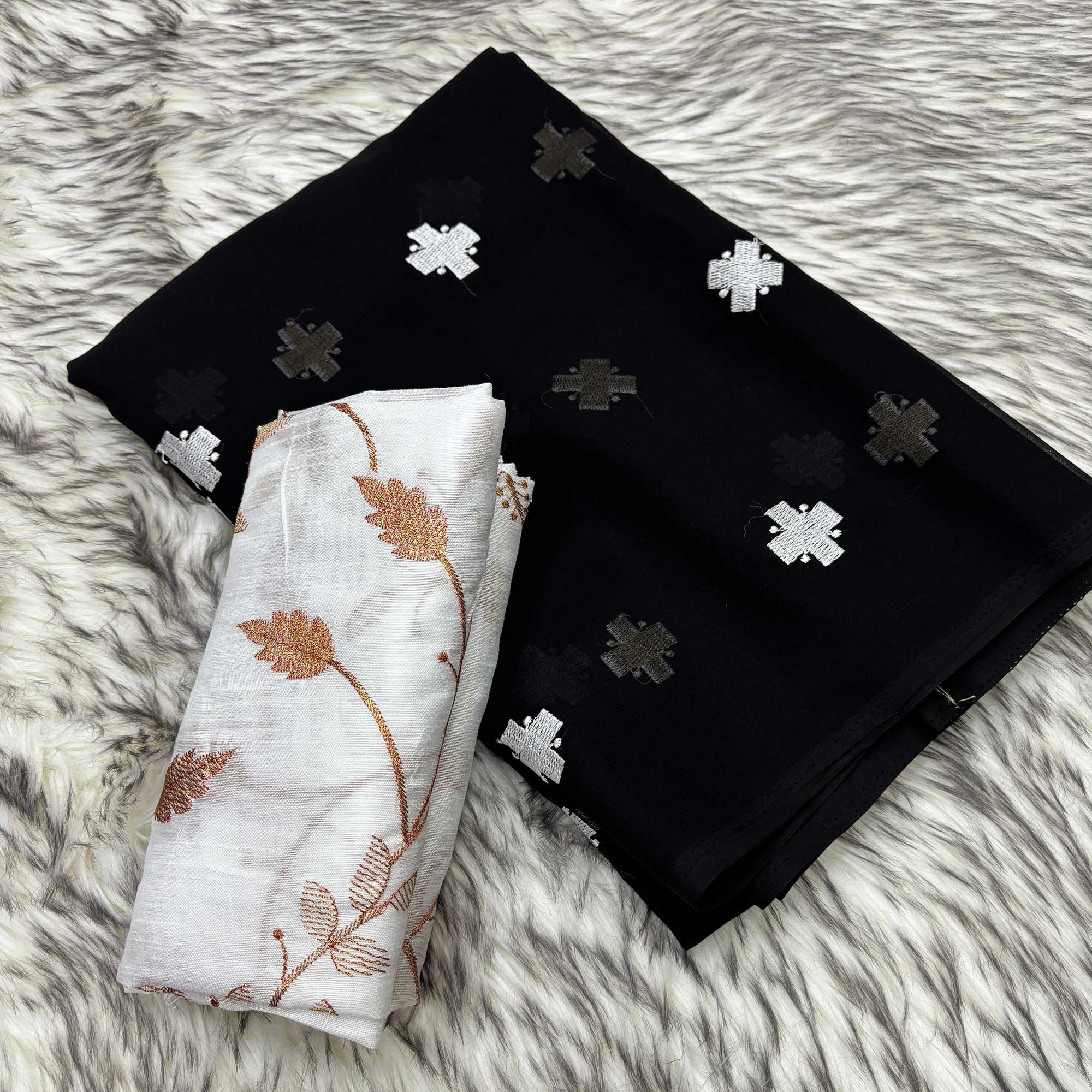 Black Embroidered Georgette Saree With Tassels