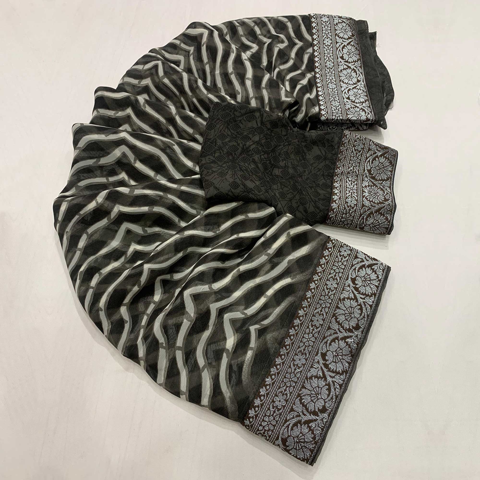 Black Leheriya Printed Georgette Saree With Woven Border