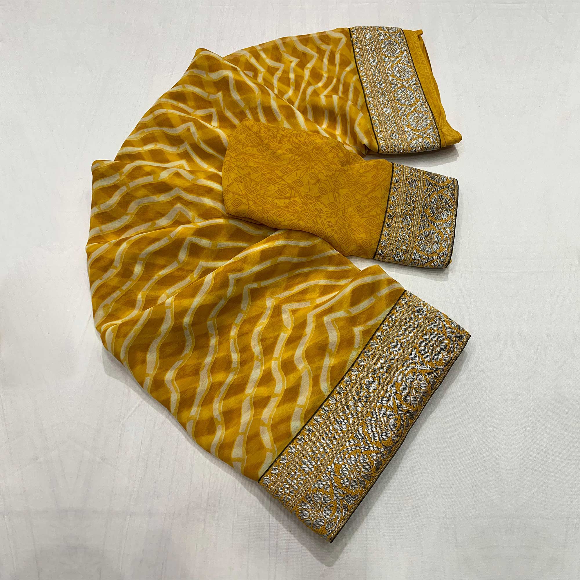 Mustard Leheriya Printed Georgette Saree With Woven Border