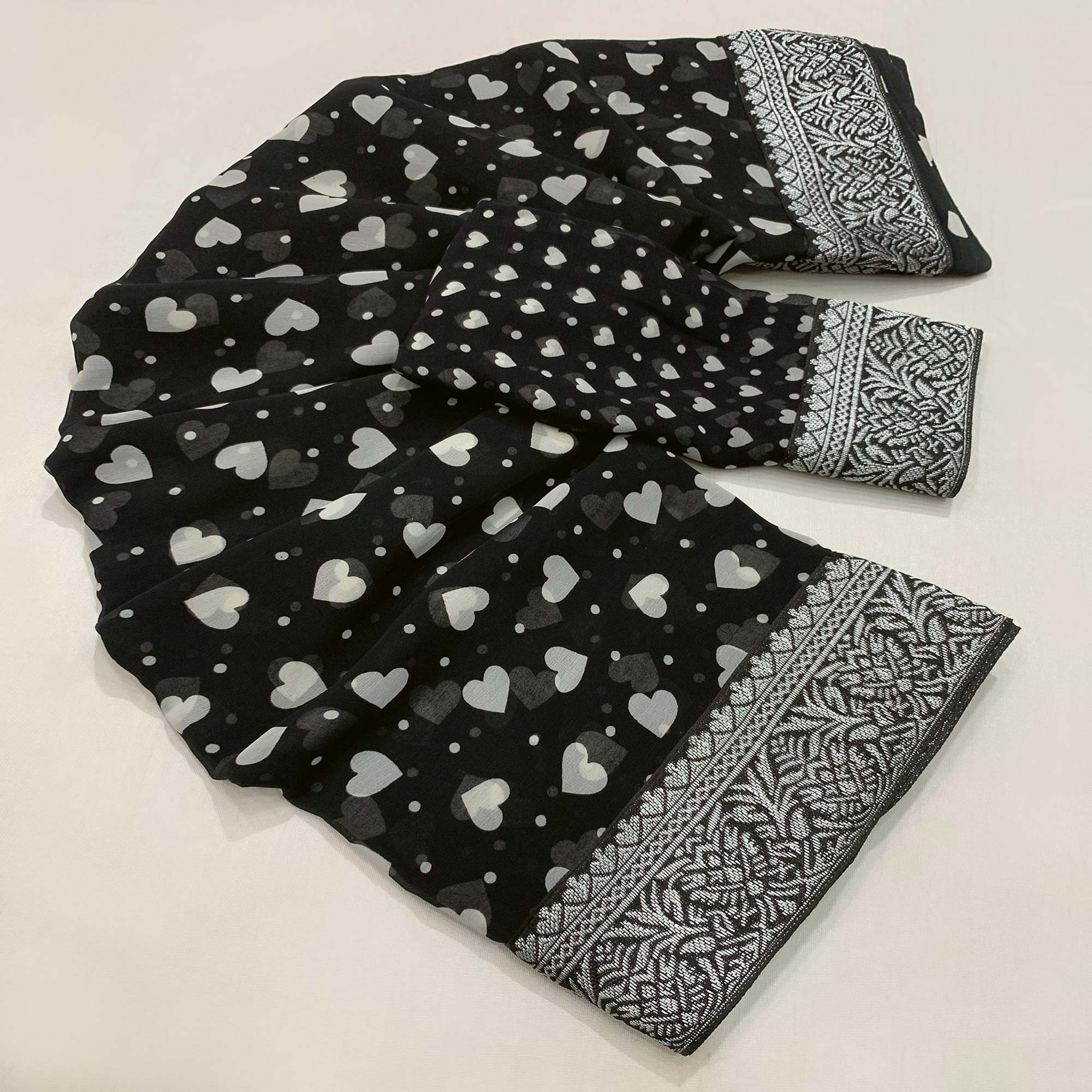 Black Heart Printed Georgette Saree With Woven Border