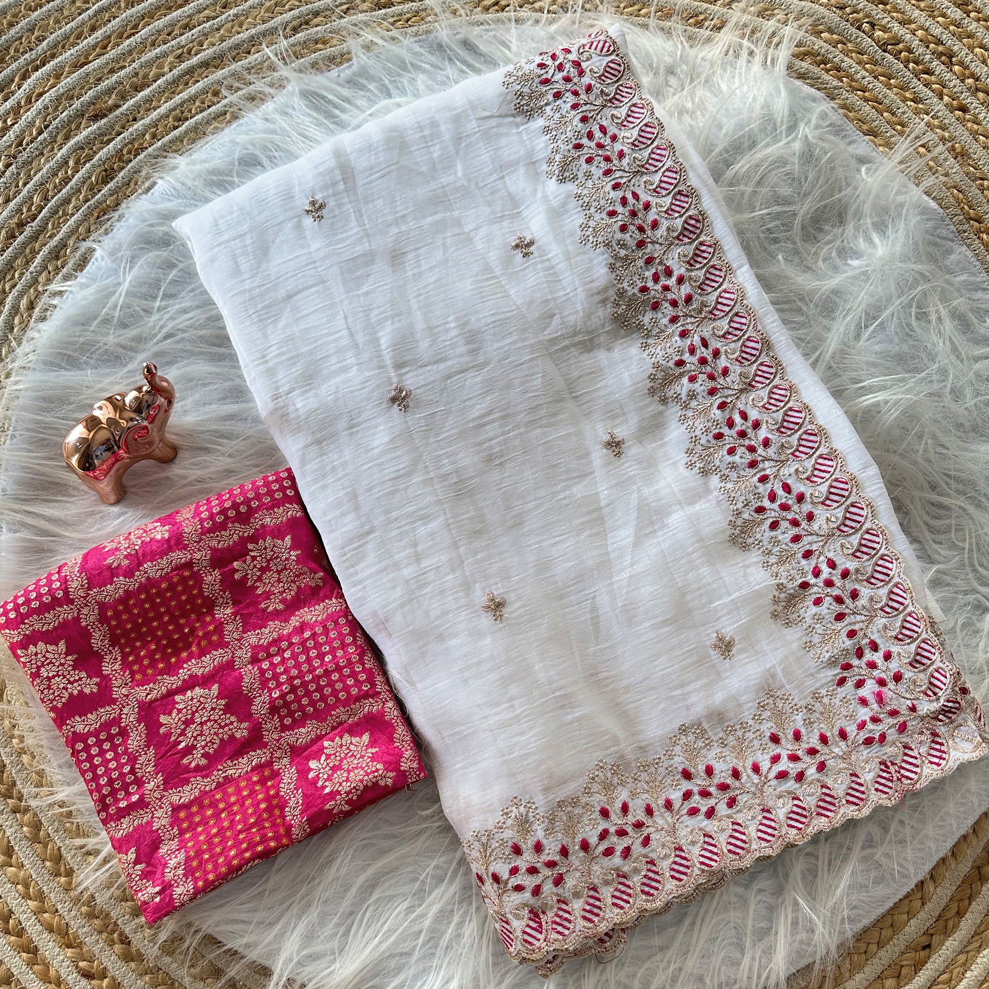 White Paper Crush Pure Silk Saree Featuring Intricate Floral Embroidery Craftsmanship