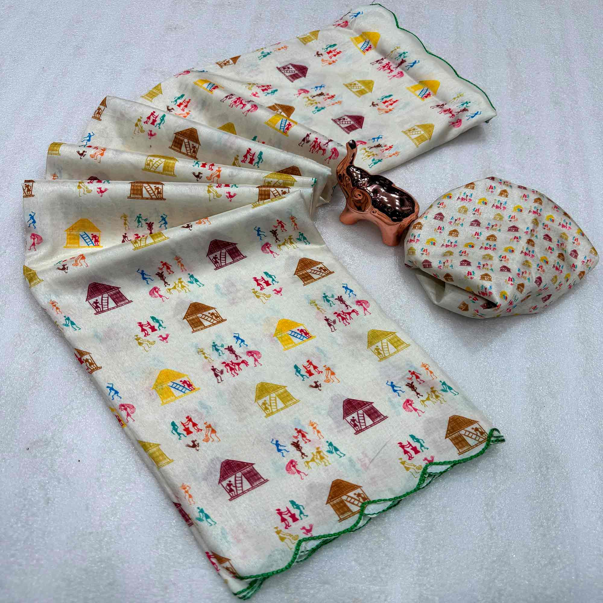 Festive Off White Soft Dola Silk Saree with Timeless Warli Print Work