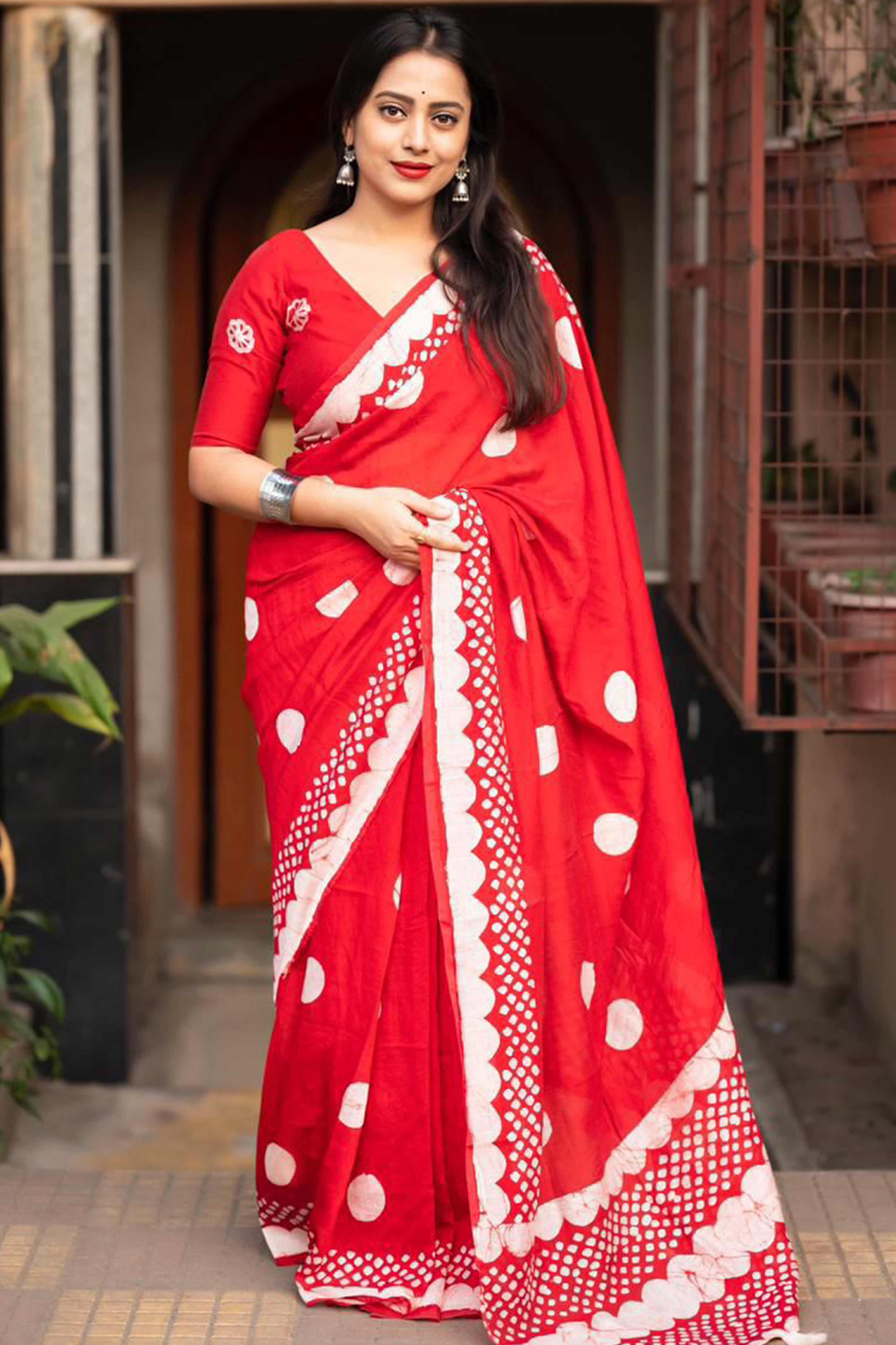 Red Linen Saree With Vibrant Polka Digital Print & Trendy Tassel Pallu