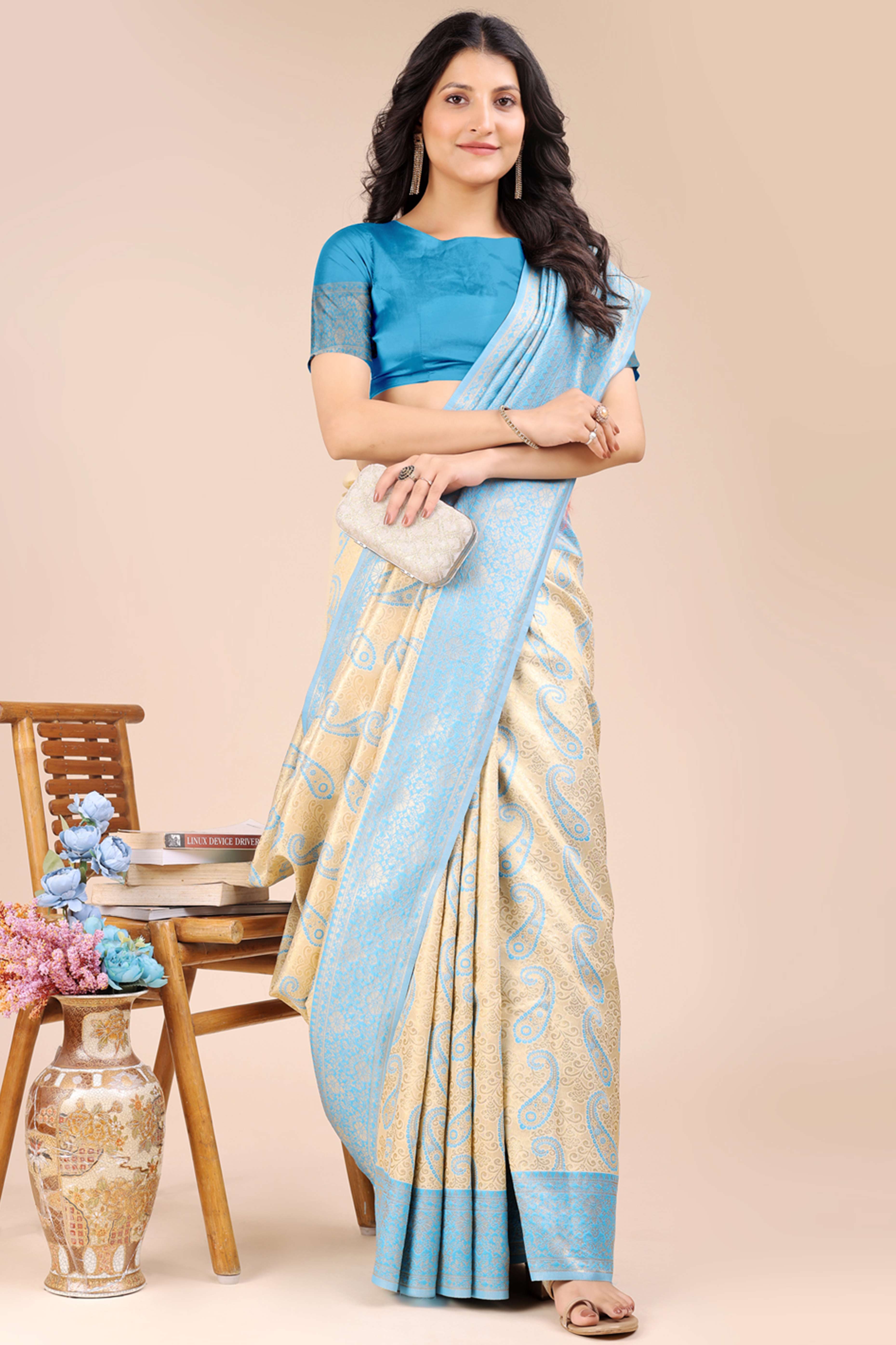 Cream Banarasi Silk Saree Featuring Sky Blue Floral Zari Weaving and a Rich Contrast Border