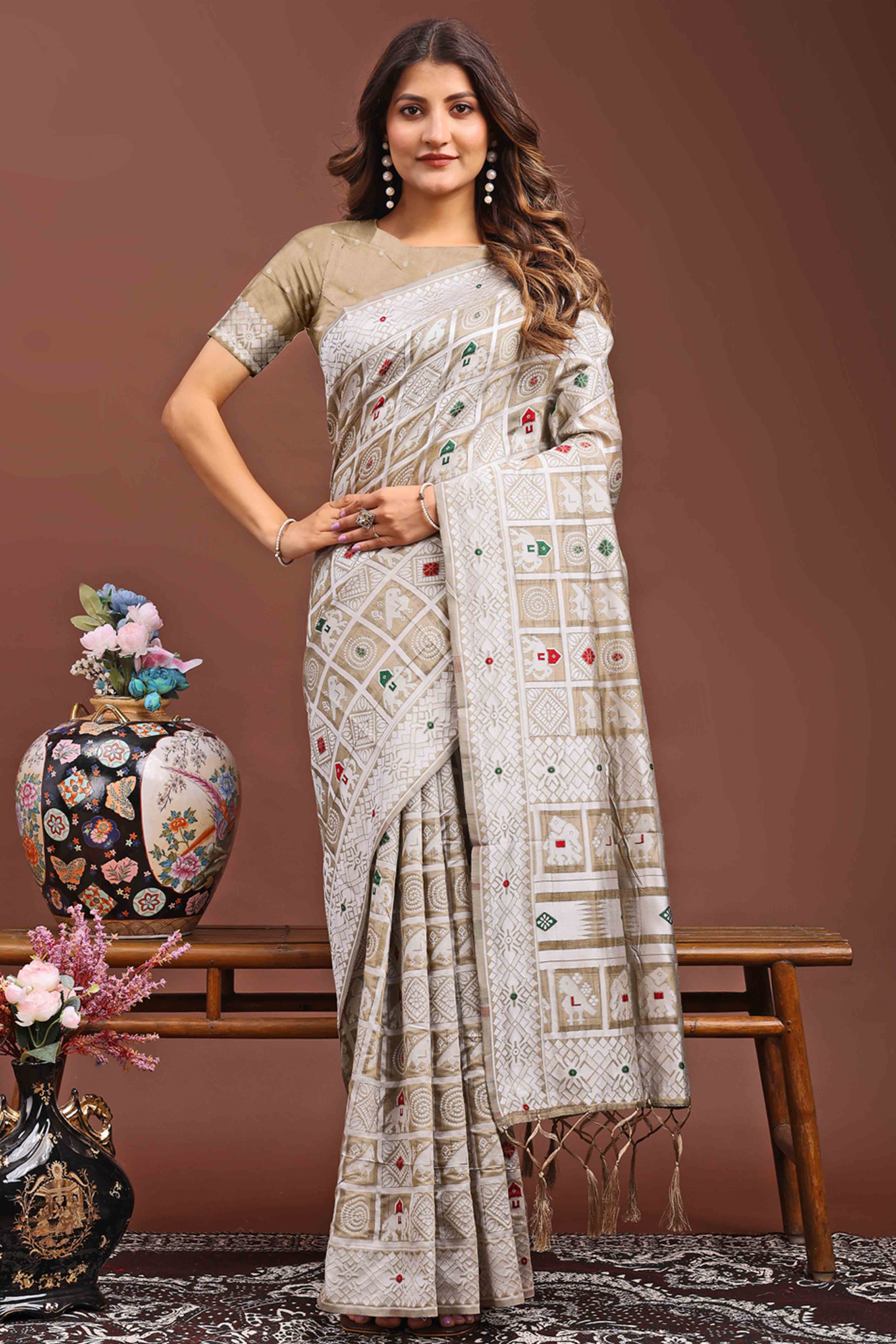 Brown Linen Cotton Saree Adorned With Zari Weaving & Tassel pallu