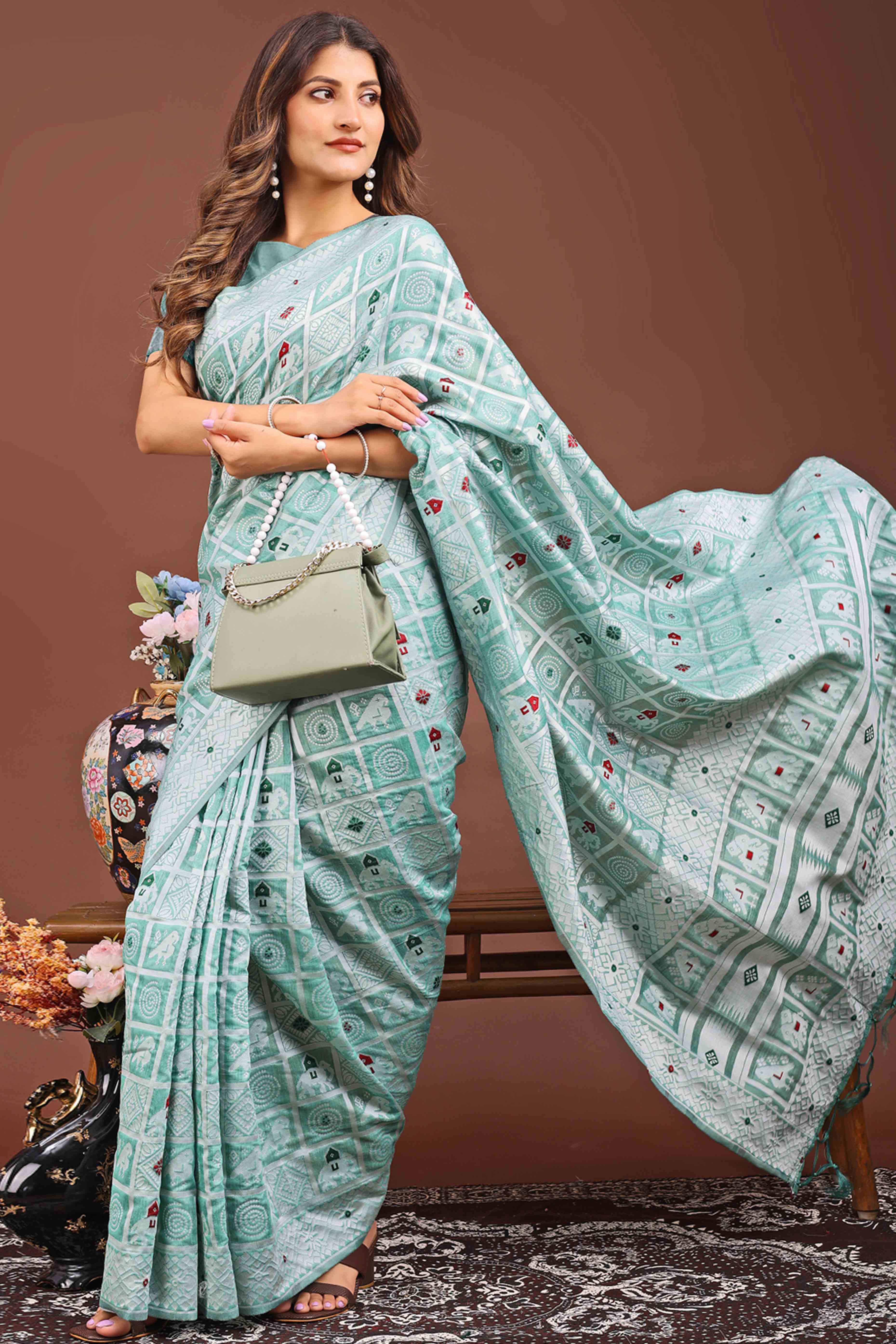 Green Linen Cotton Saree Adorned With Zari Weaving & Tassel pallu