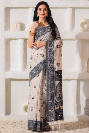 Classic Cream & Black Linen Cotton Saree Featuring Intricate Zari Weaving & Tassel Pallu