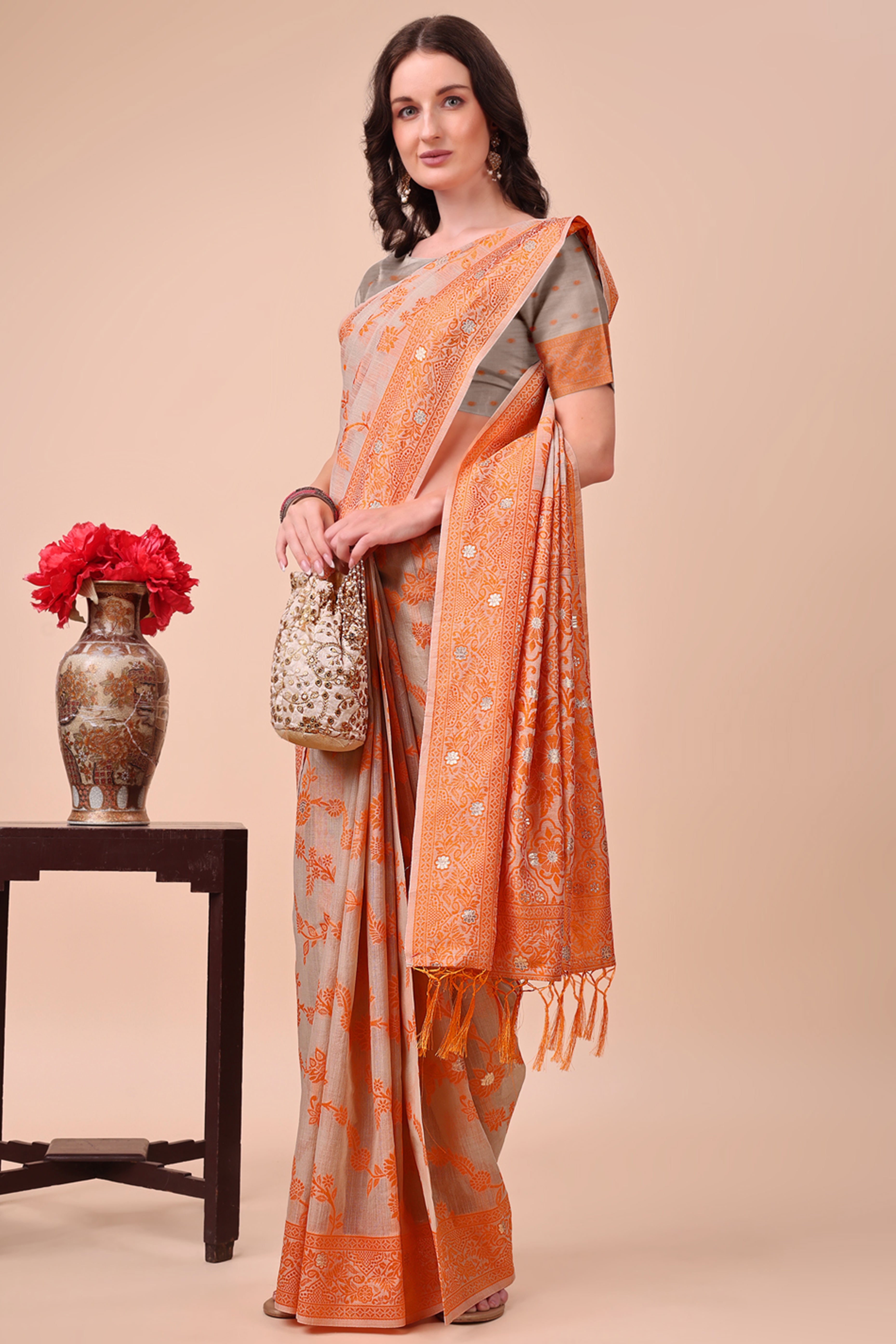 Orange Floral Zari Woven Cotton Blend Saree With Delicate Tassel Detailing