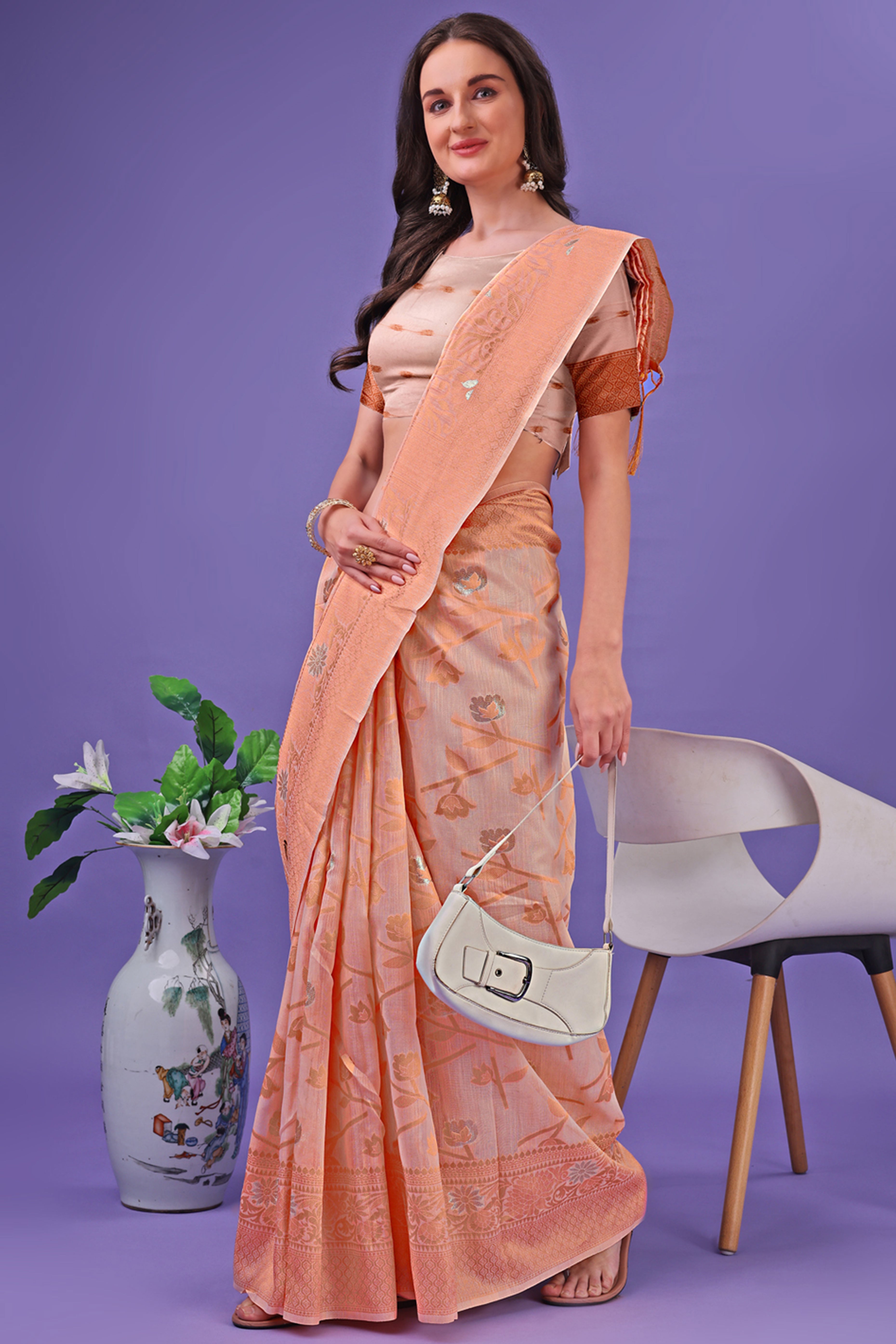 Peach Floral Pattern Woven Saree in a Soft Cotton Blend with Tasseled Edges