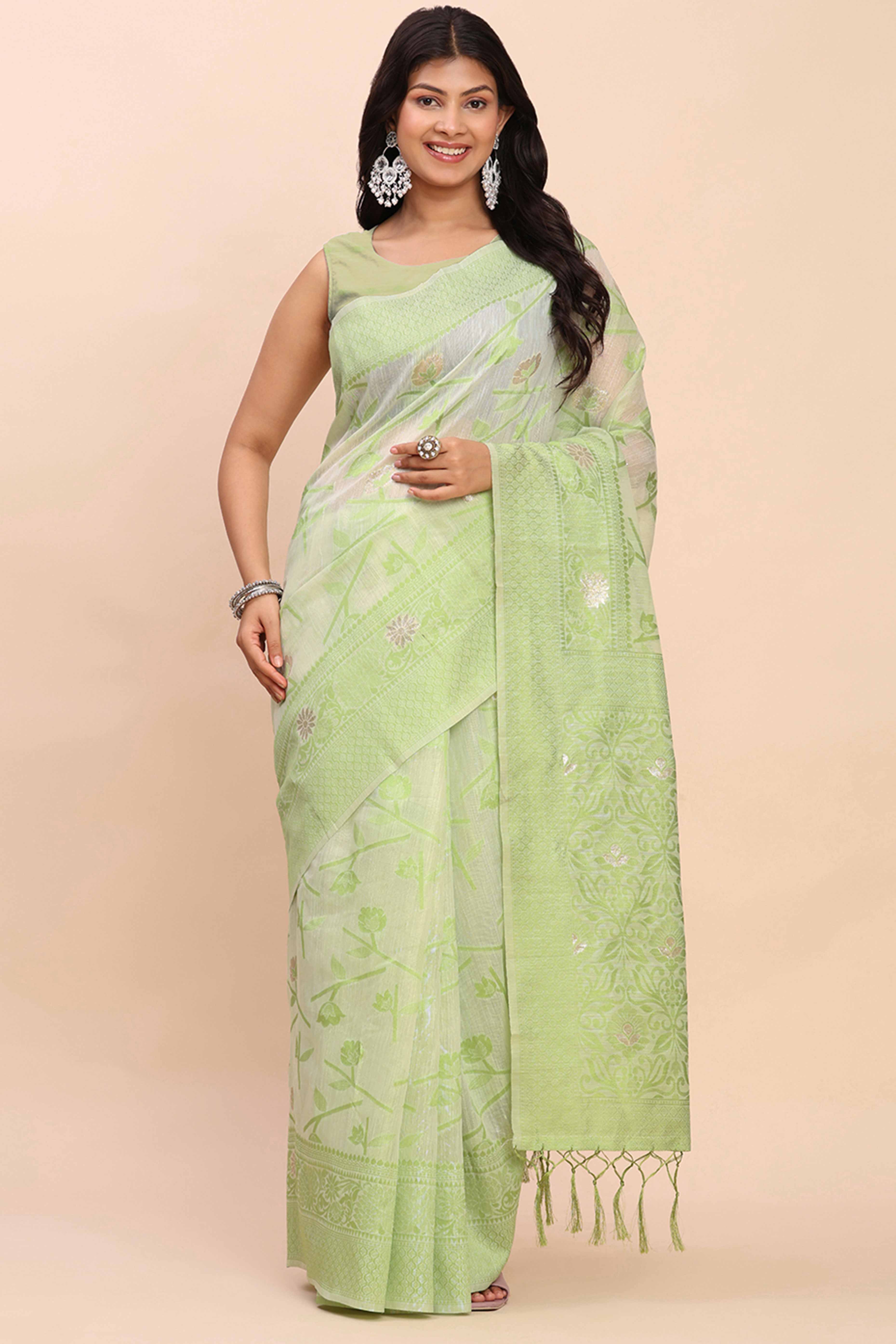 Light Green Floral Linen Cotton Saree Accented With Zari Weaving & Tassel Pallu Elegance