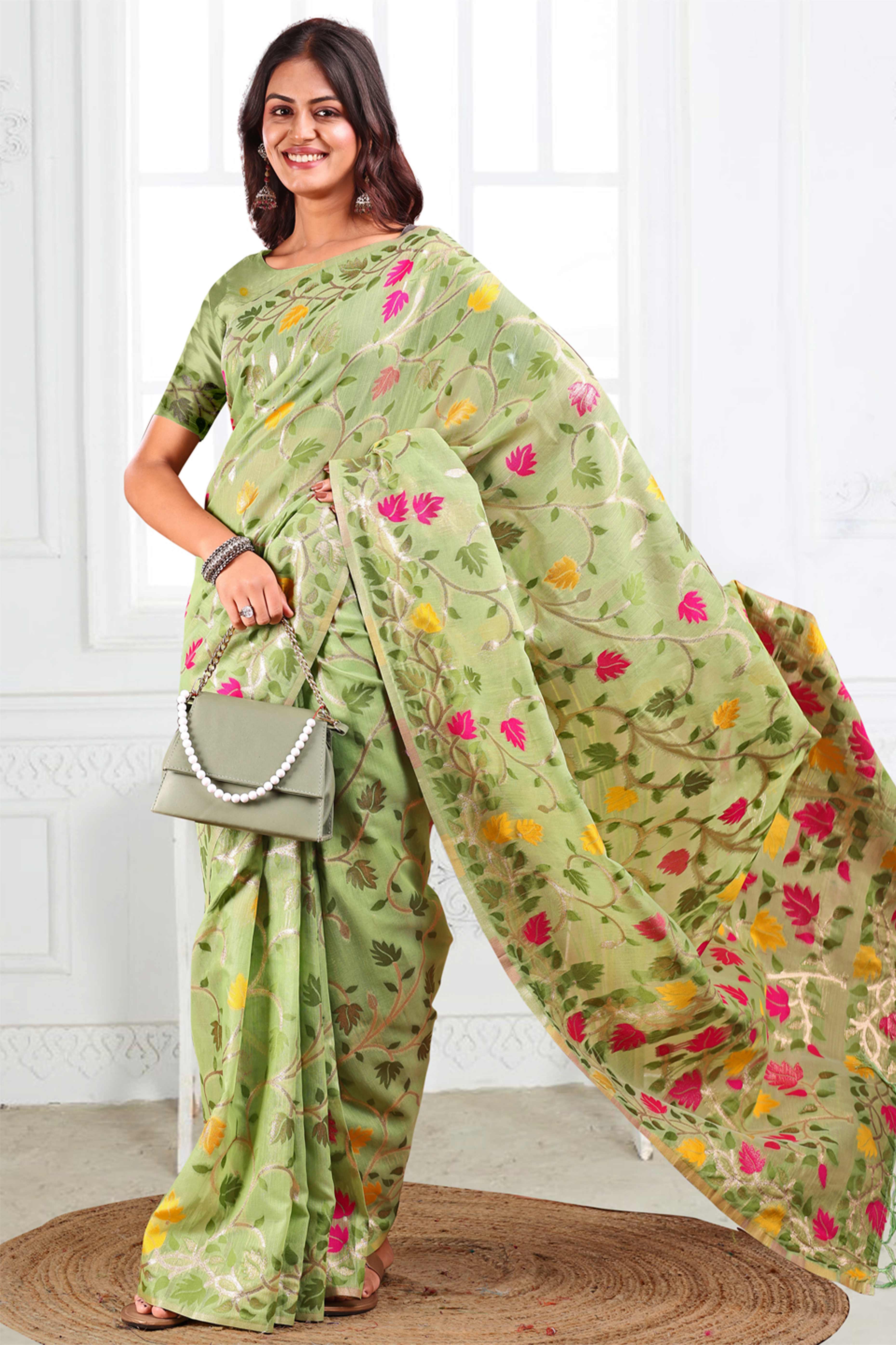 Light Green Linen Cotton Silk  Saree Enhanced With Floral Zari Weaving & Tasselled Pallu Finish