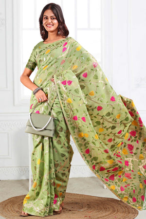 Light Green Linen Cotton Silk Saree Enhanced With Floral Zari Weaving & Tasselled Pallu Finish