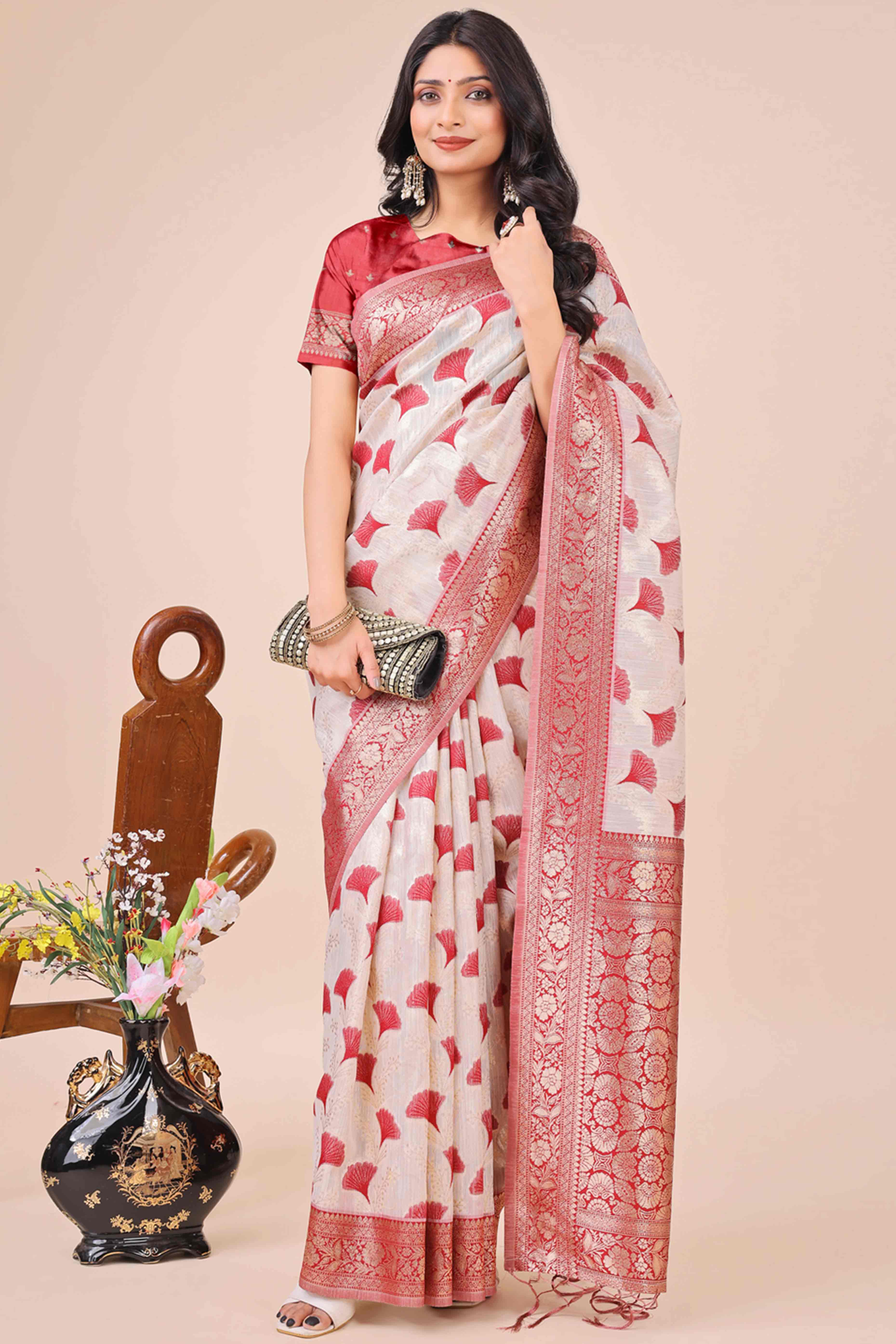 Maroon Saree In Linen Cotton With Beautiful Floral Woven Patterns & a Tassel