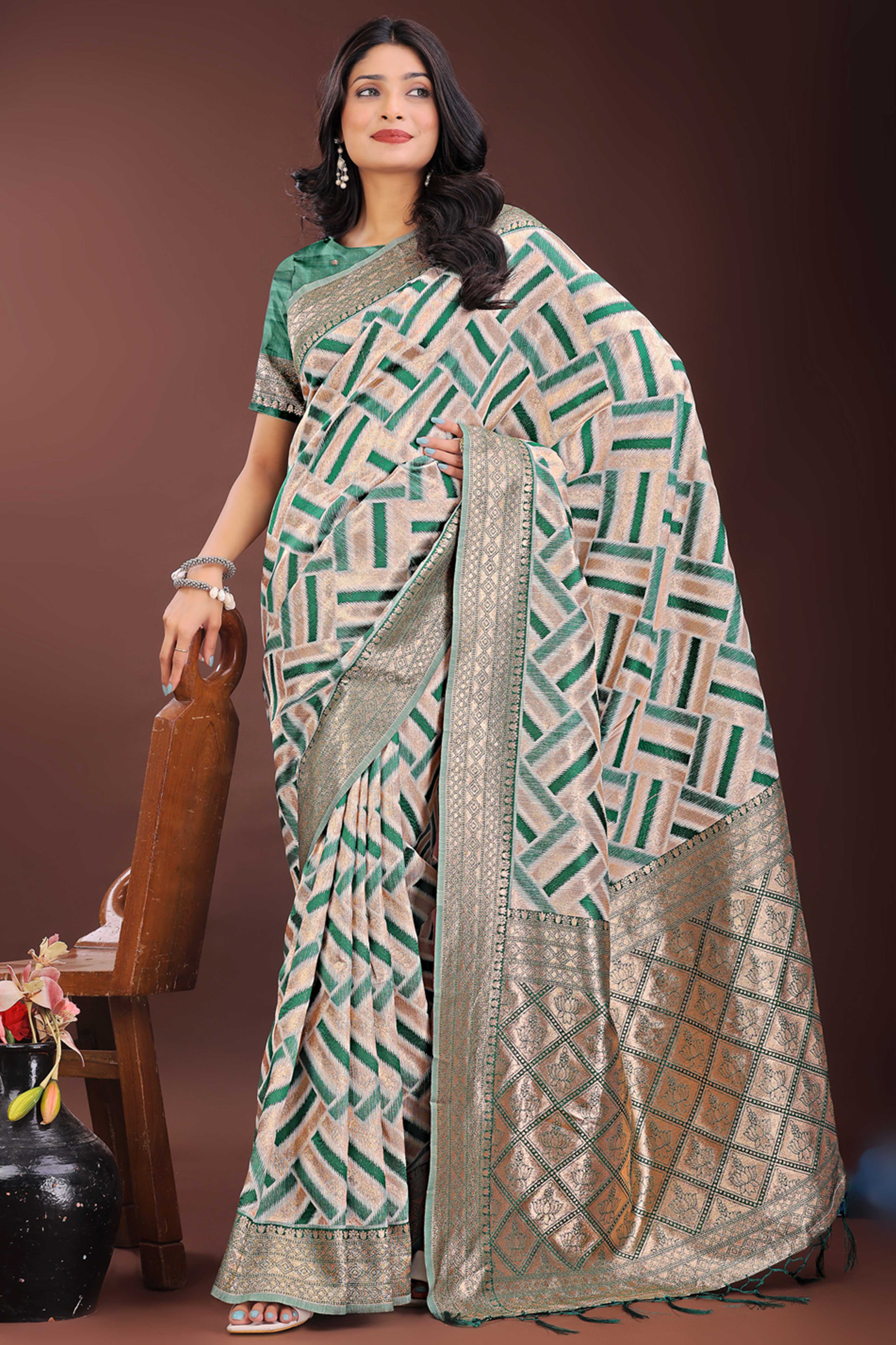 Green Saree with Zari Woven Geometric Motifs and Graceful Tassel Accents