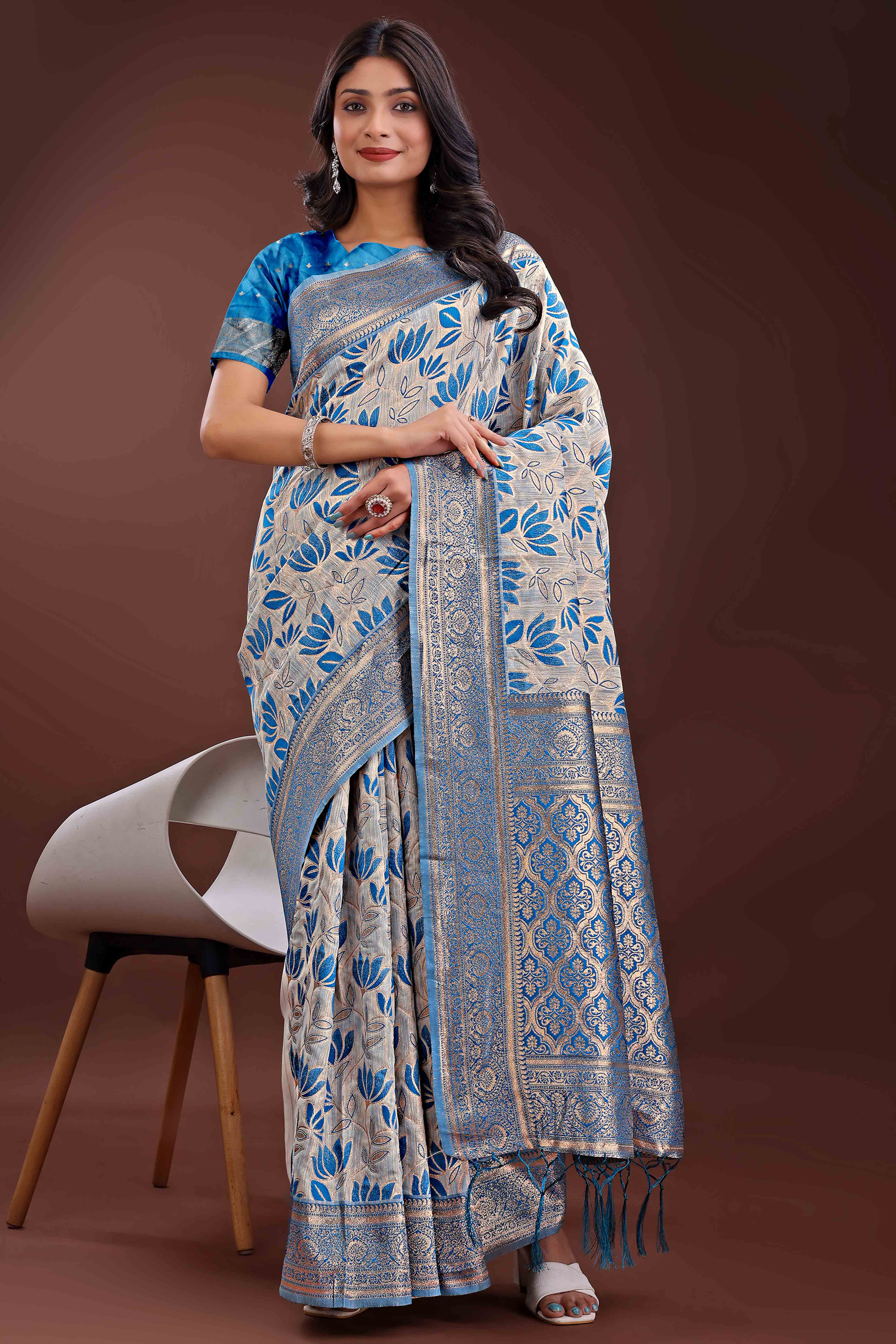 Blue Linen Cotton Saree Featuring Graceful Floral Patterns in Zari Weave