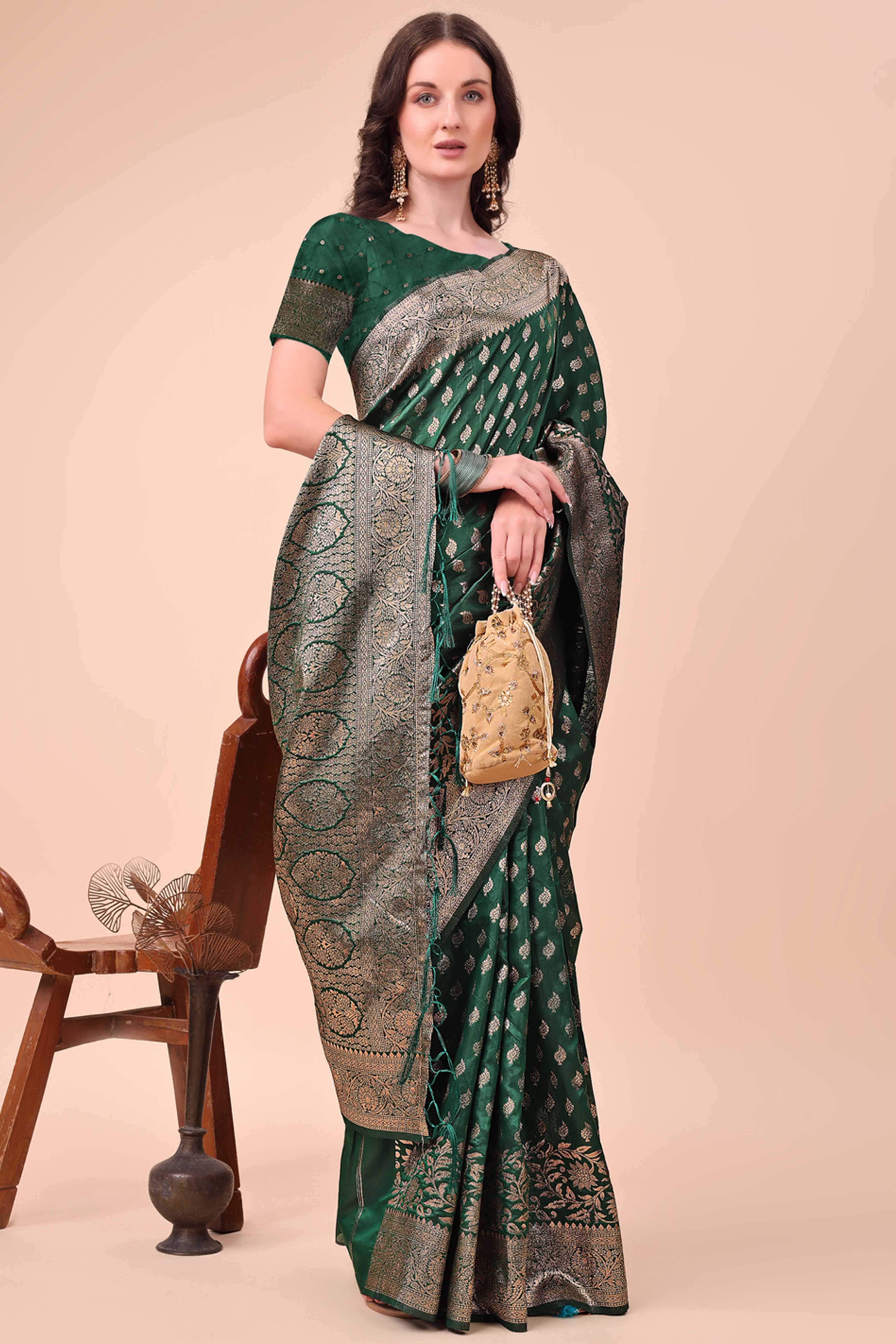 Green Saree In Lichi Silk Blend With Floral Zari Weaving & Delicate Tassel Border