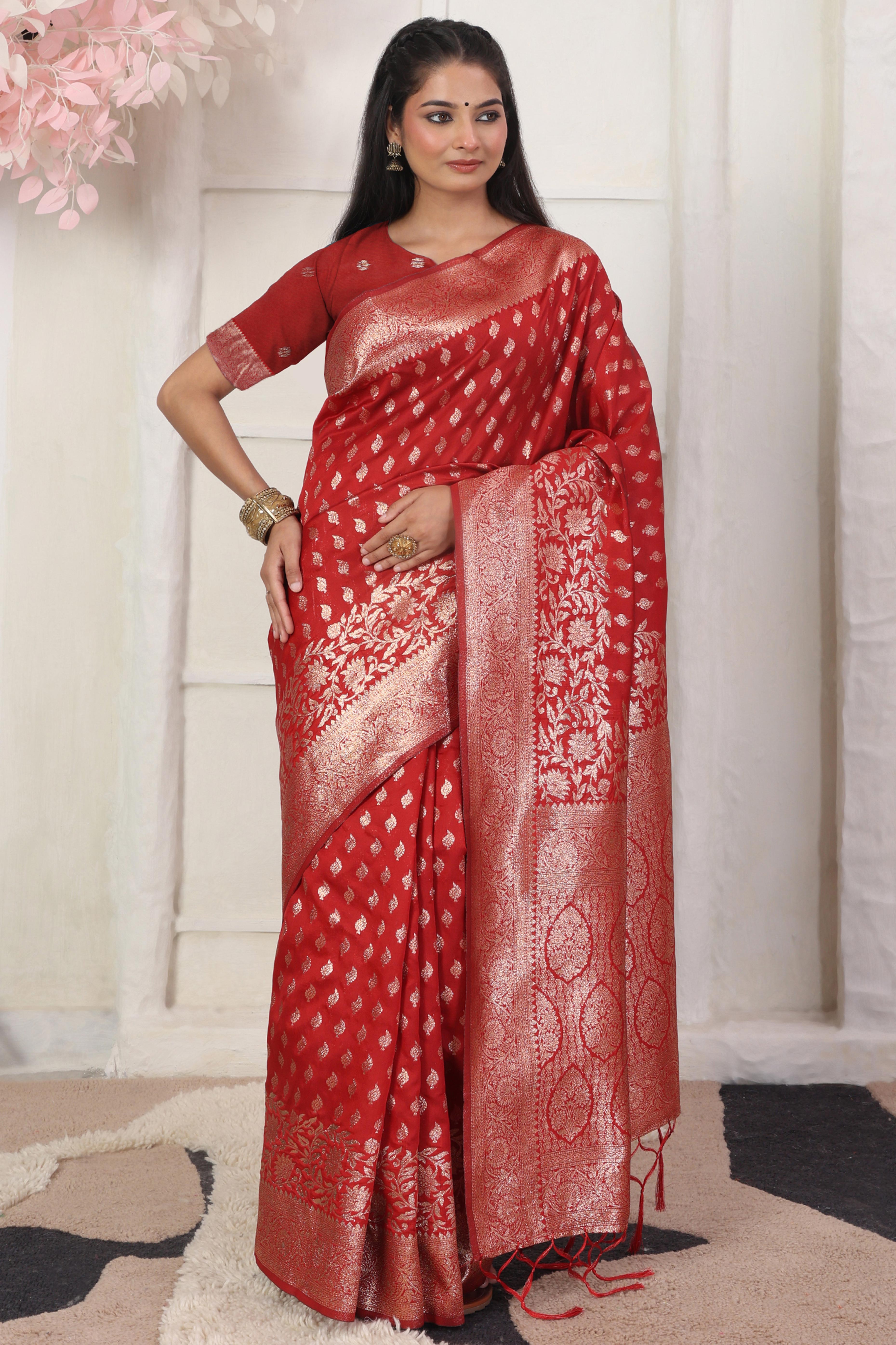 Red Traditional Lichi Silk Blend Saree Enhanced With Floral Zari Weaving & Tassel Pallu
