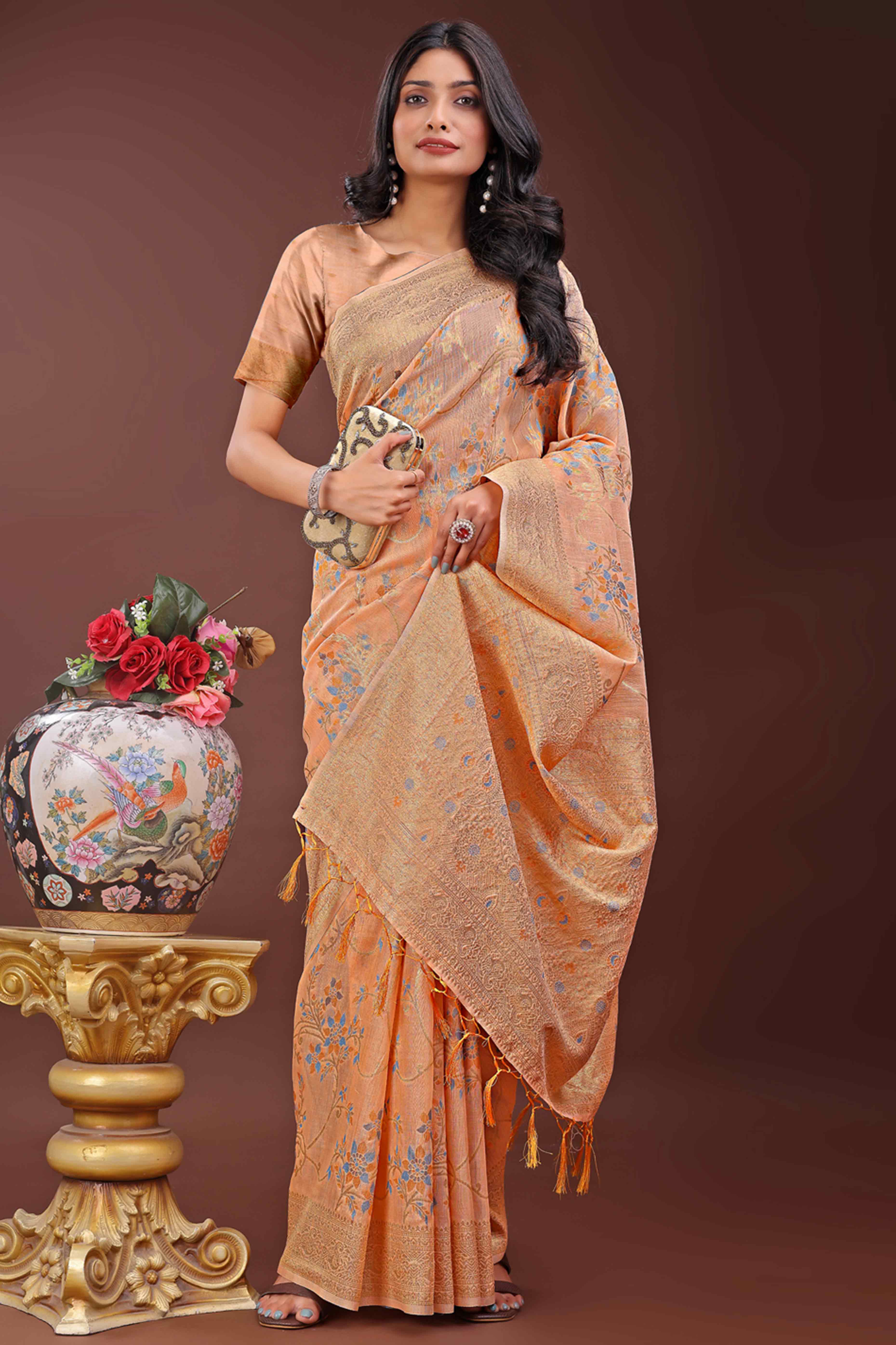 Orange Linen Cotton Saree With Intricate Floral Zari Weaving & Tassel Edge