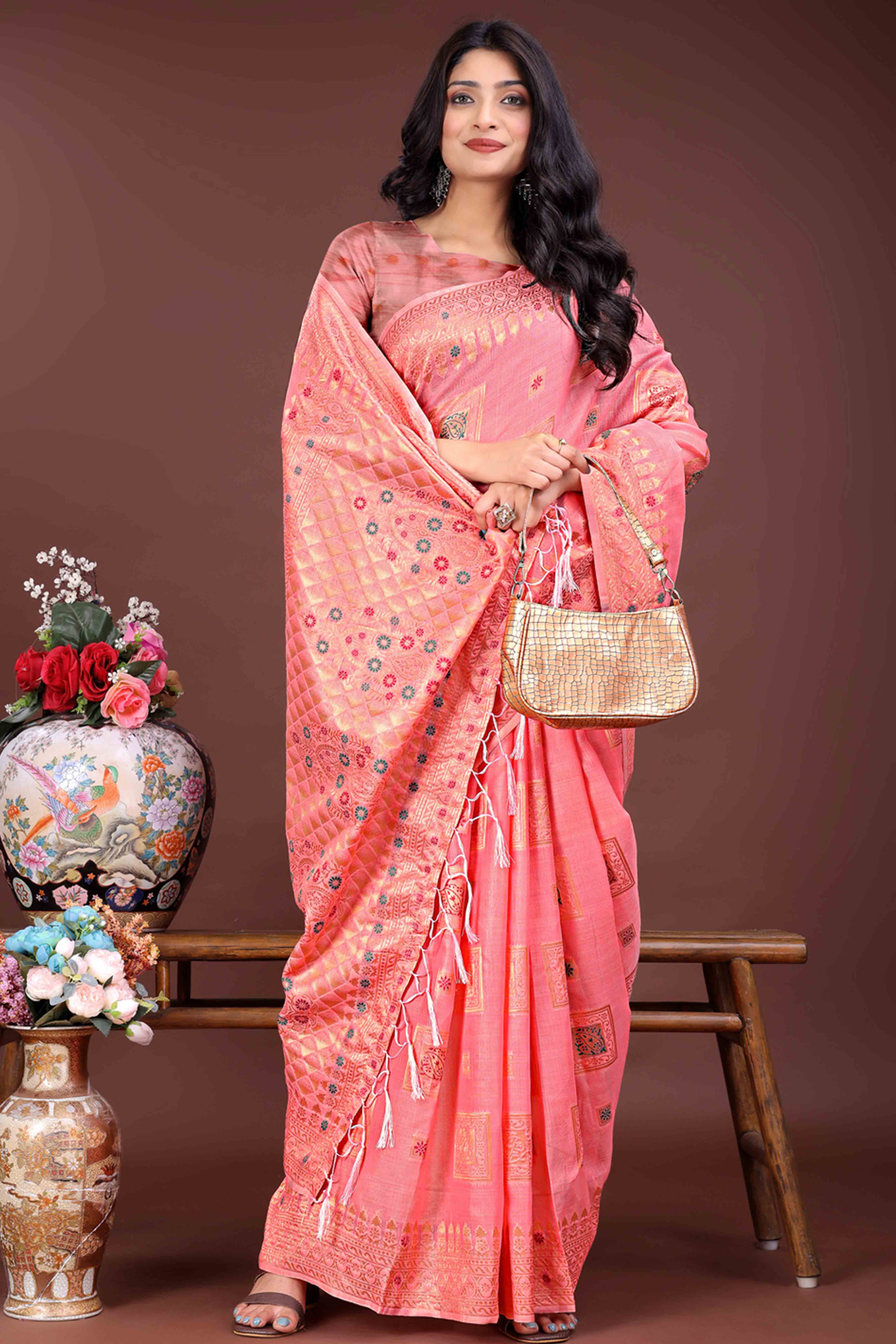 Refreshing Floral Zari Weaving Embellished Gajari Pink Saree In Linen Cotton with Tassel Accents