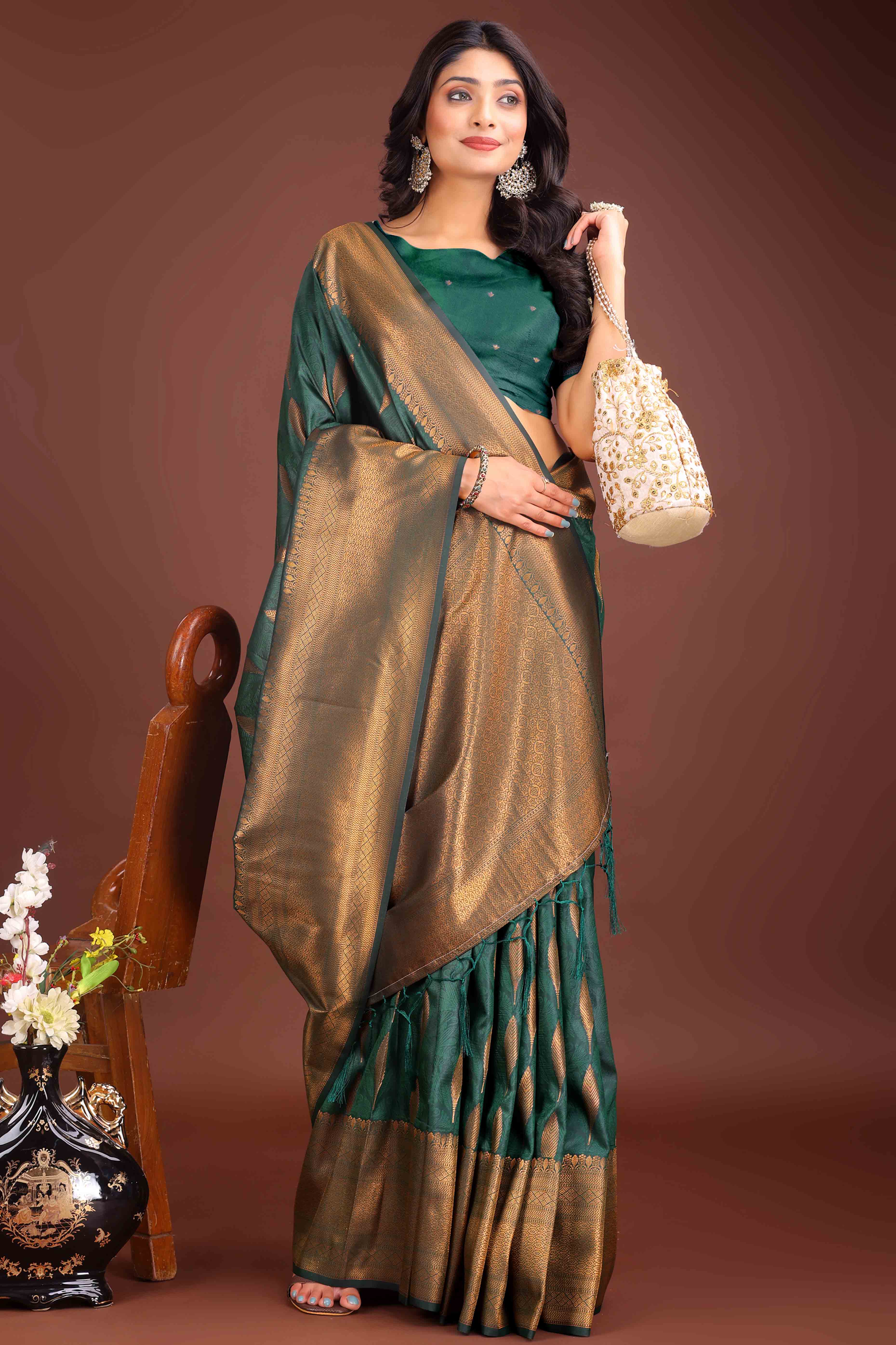 Green Zari Woven Banarasi Silk Saree With Timeless Tassel Border