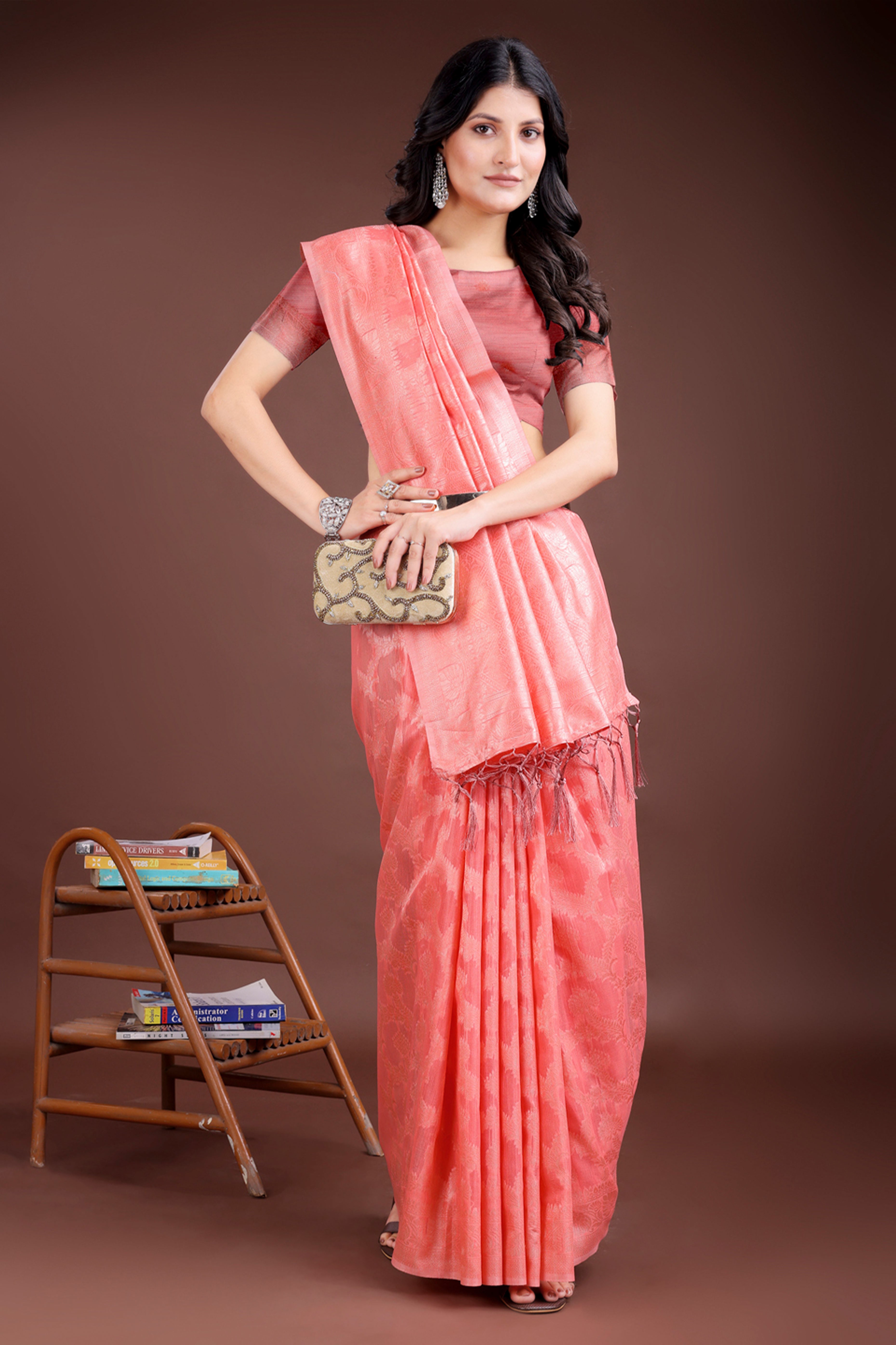 Peach Linen Cotton Saree with Lustrous Zari Borders and Elegant Tassel Accents